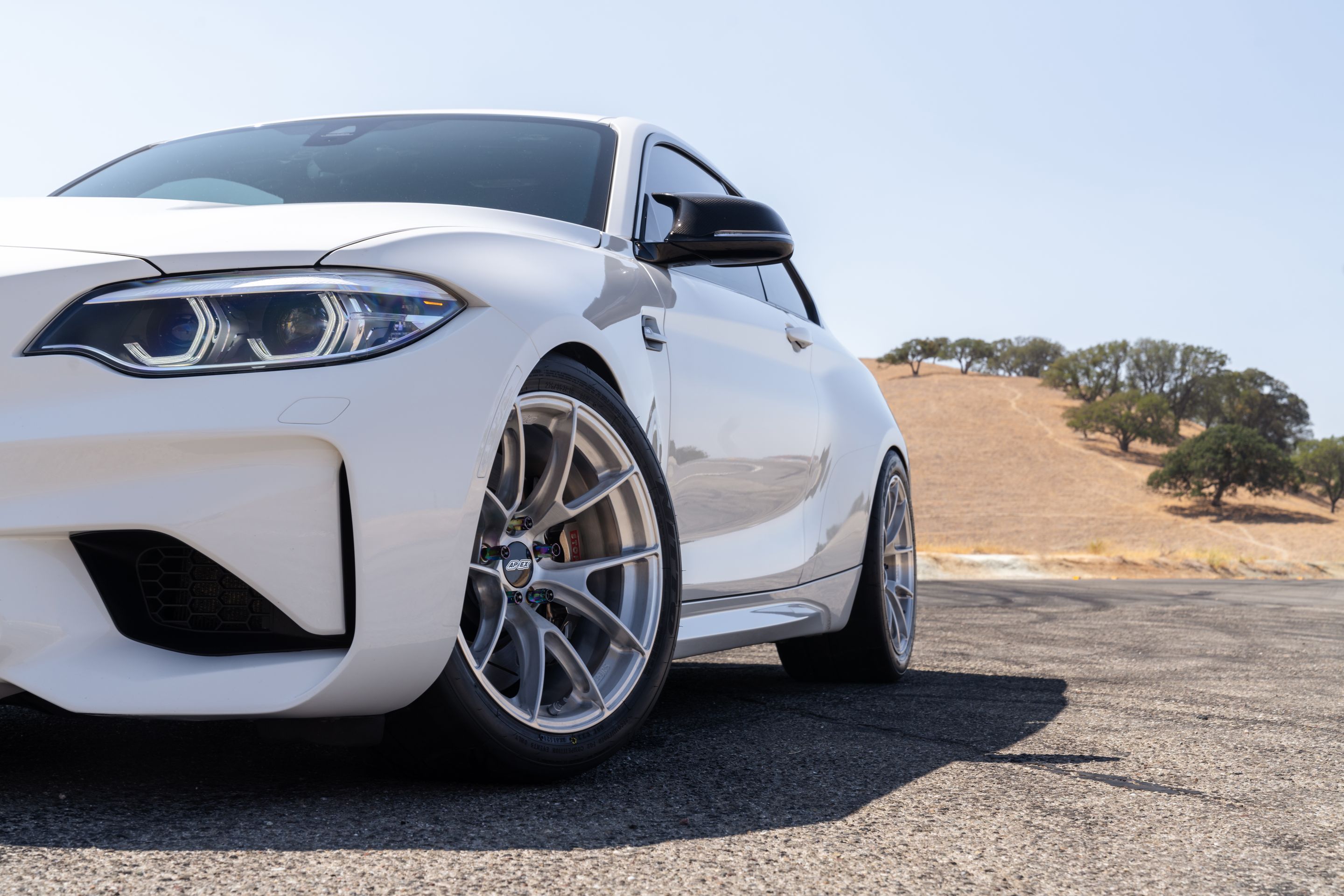 White BMW F87 M2 with 18" VS-5RS Apex wheels in Brushed Clear