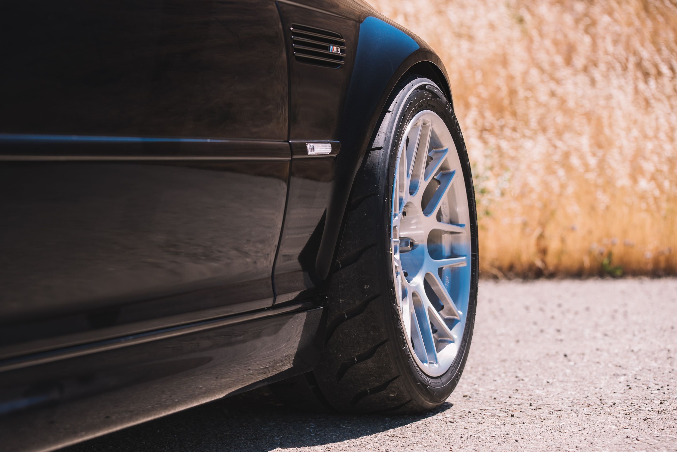 Black BMW E46 M3 with 18" ARC-8R Apex wheels in Brushed Clear