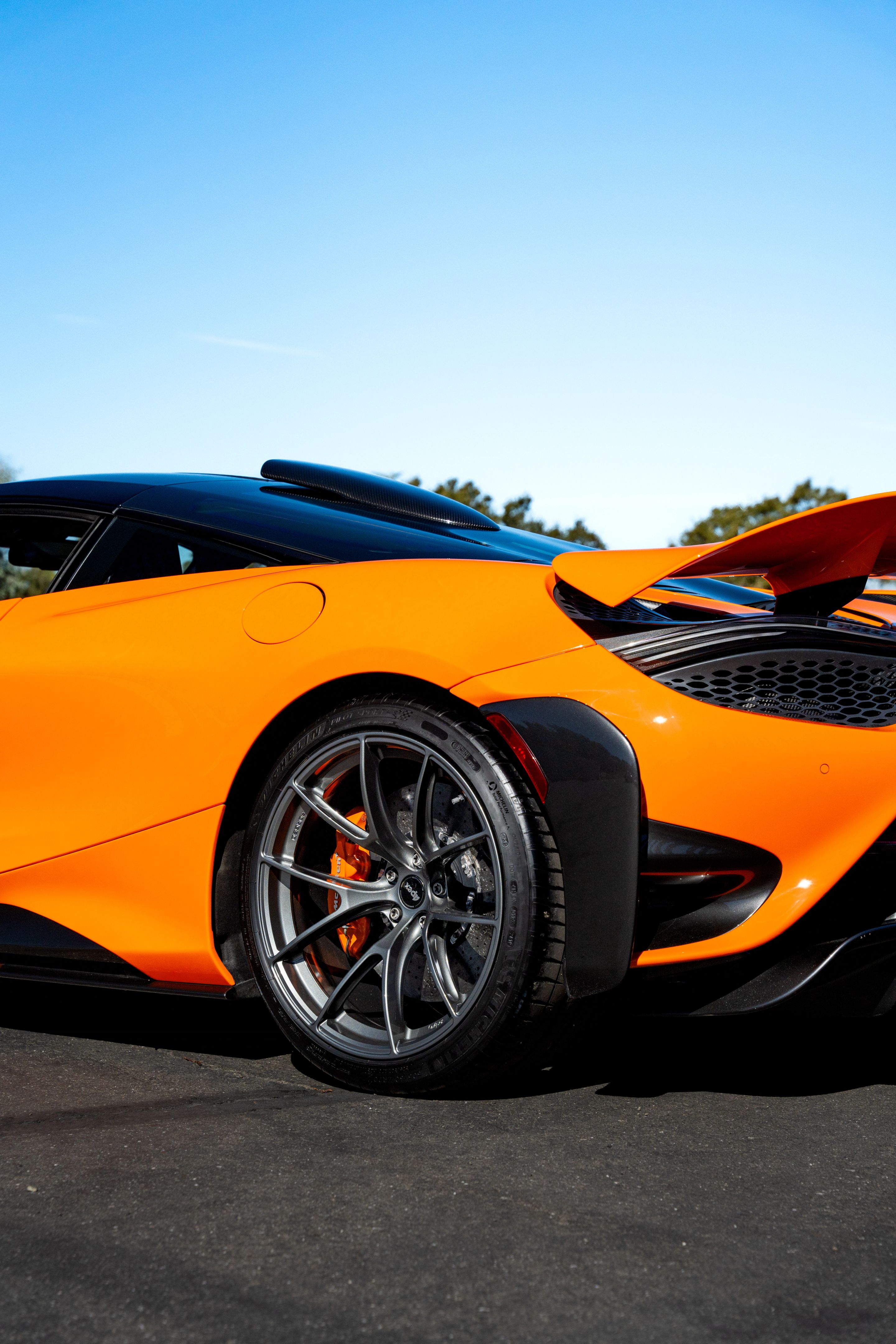 Orange McLaren 765LT with 19"/20" VS-5RS Apex wheels in Anthracite