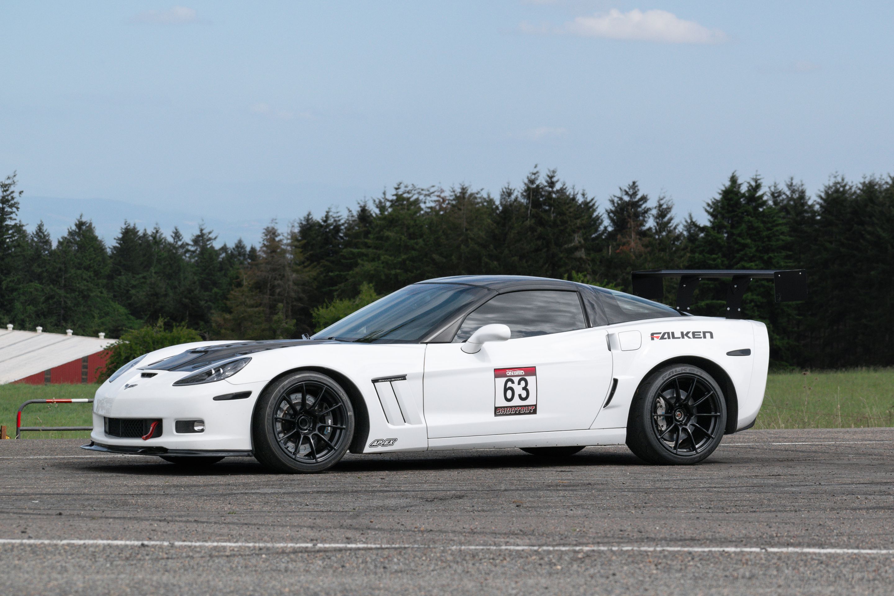 White Chevrolet C6 Corvette Grand Sport with 18"/19" SM-10RS Apex wheels in Satin Black