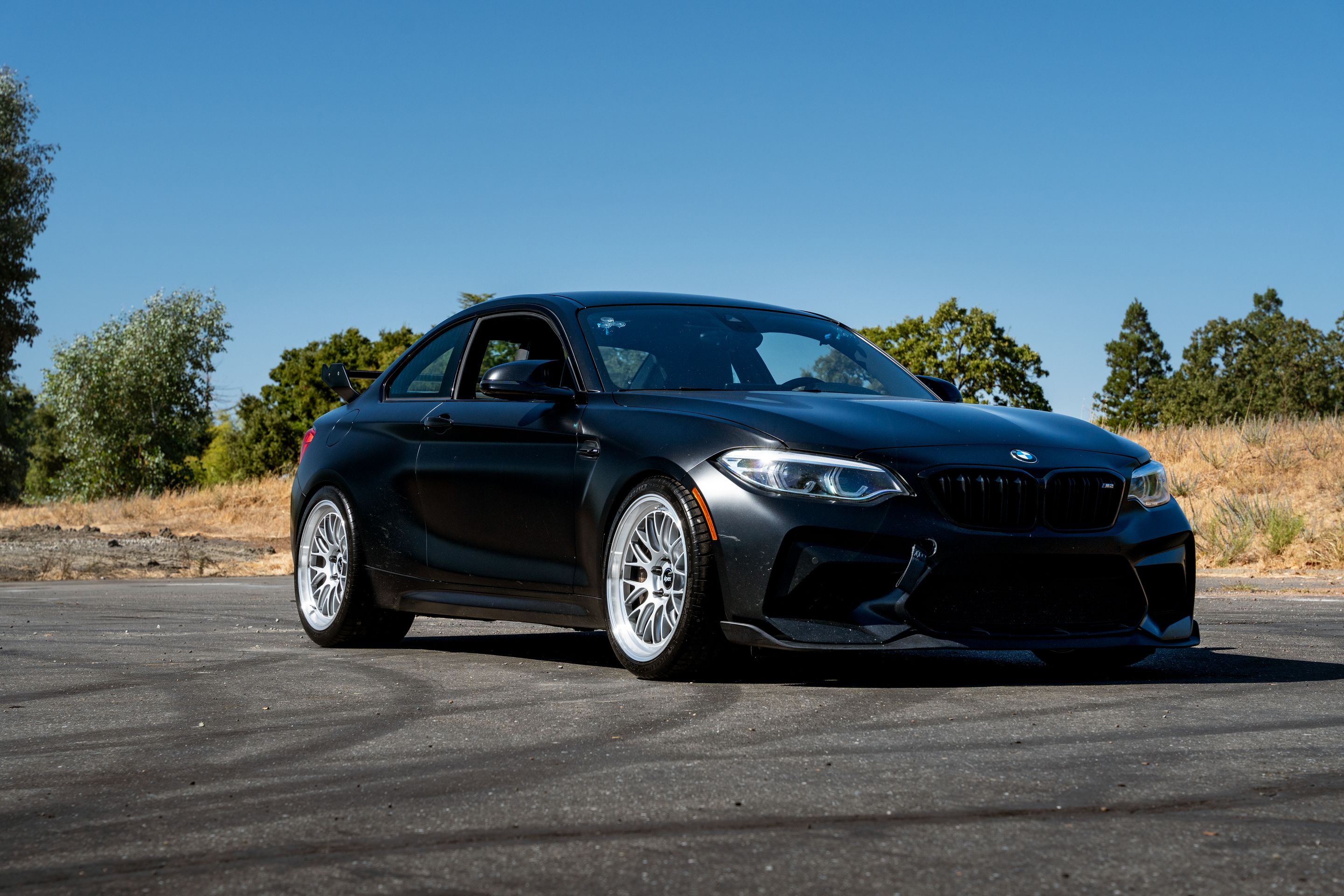 Black BMW F87 M2 with 19" ML-10RT Apex wheels in Machined Lip Race Silver