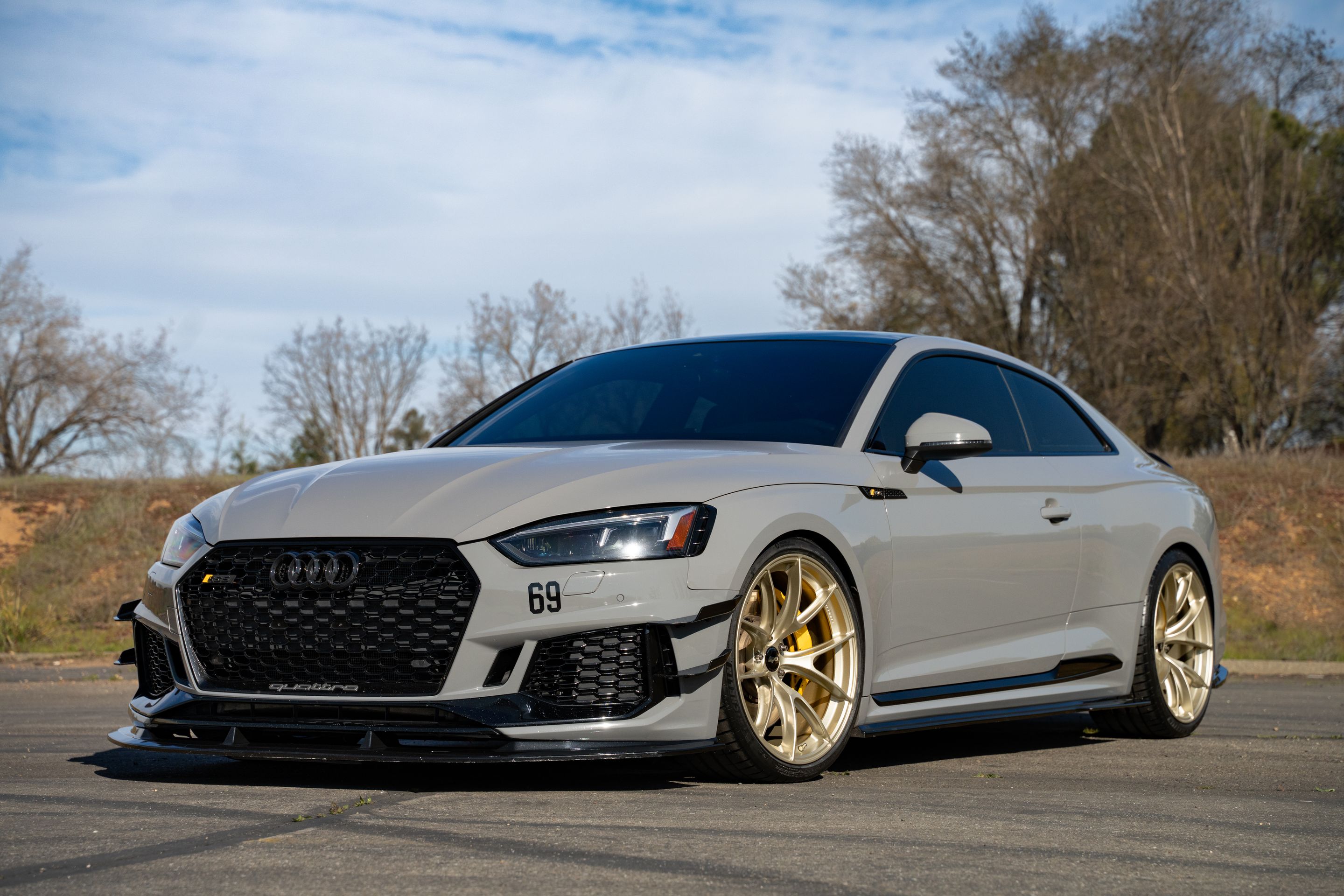 Grey Audi B9 RS 5 Coupe with 20" VS-5RS Apex wheels in Motorsport Gold