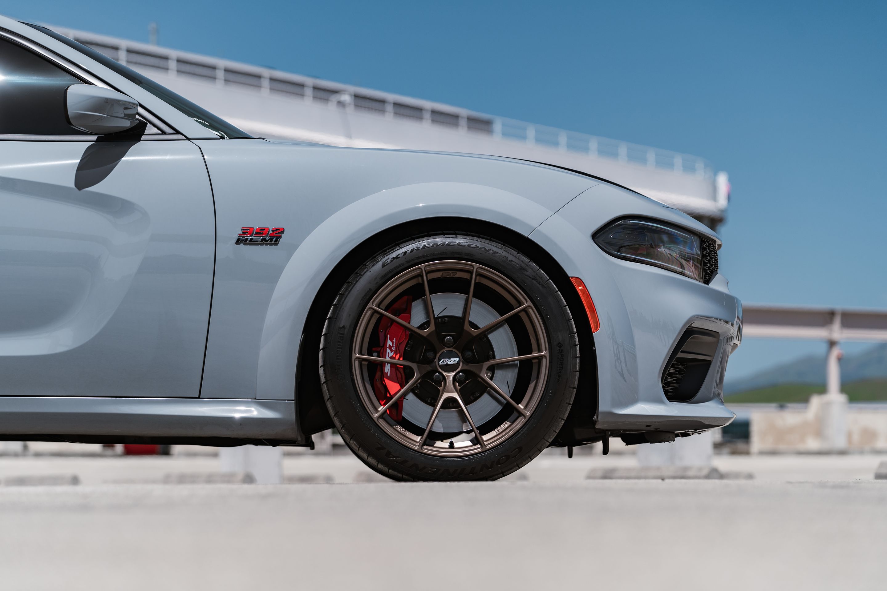 Grey Dodge Charger Scat Pack Widebody with 20" VS-5RS Apex wheels in Satin Bronze