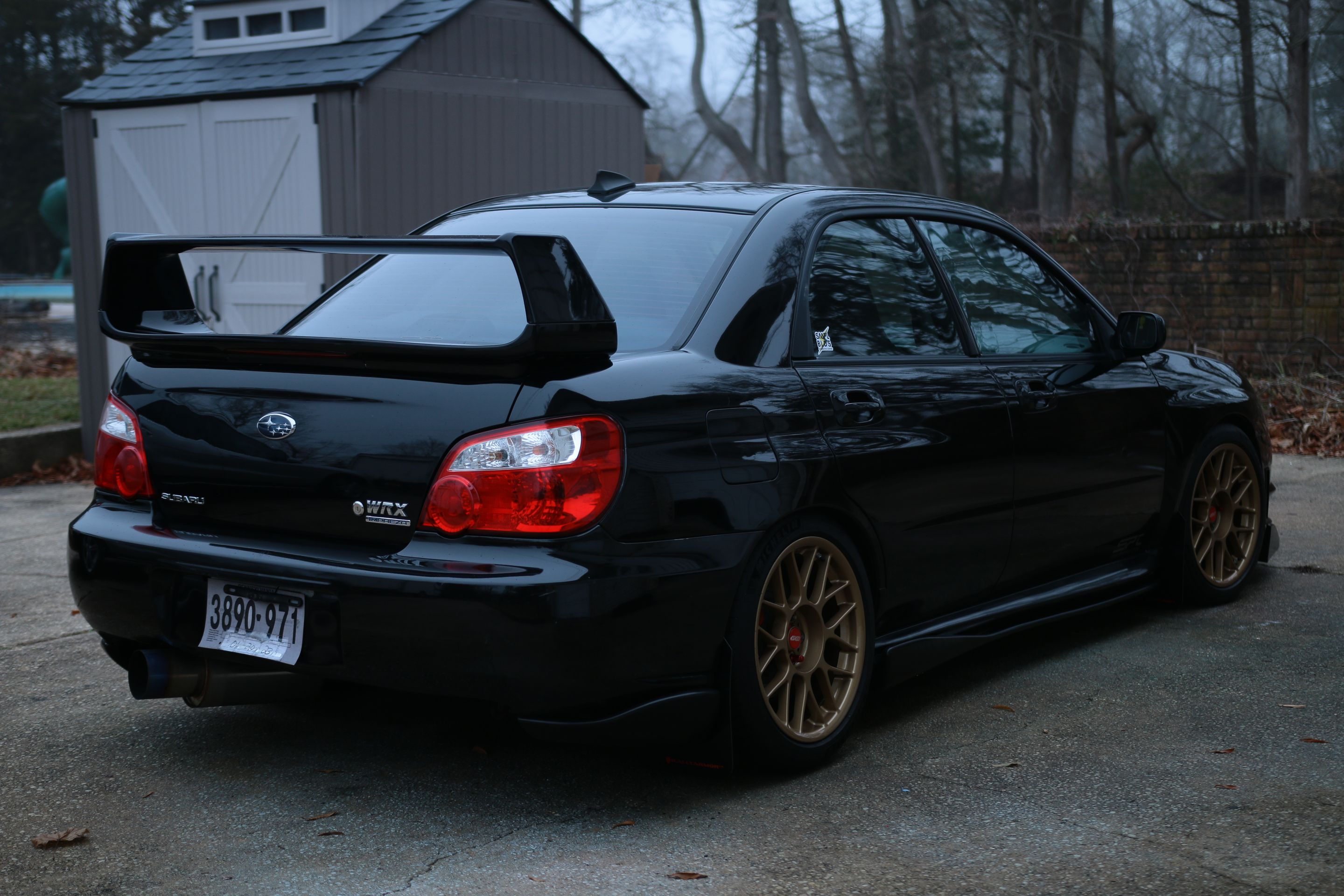 Black Subaru GD WRX Sedan with 17" ARC-8 Apex wheels in Satin Bronze