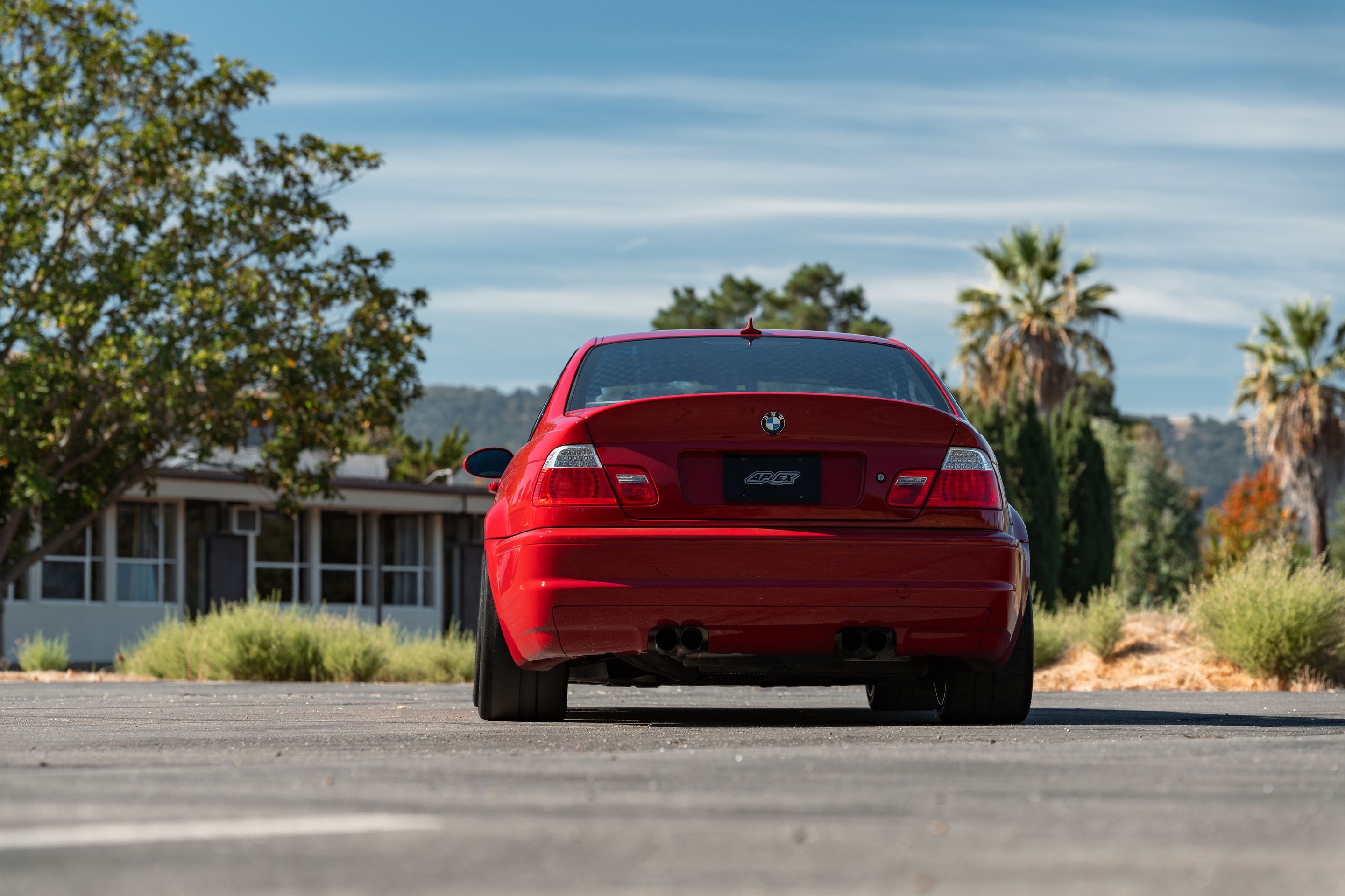 Red BMW E46 M3 with 18" EC-7RS Apex wheels in Anthracite