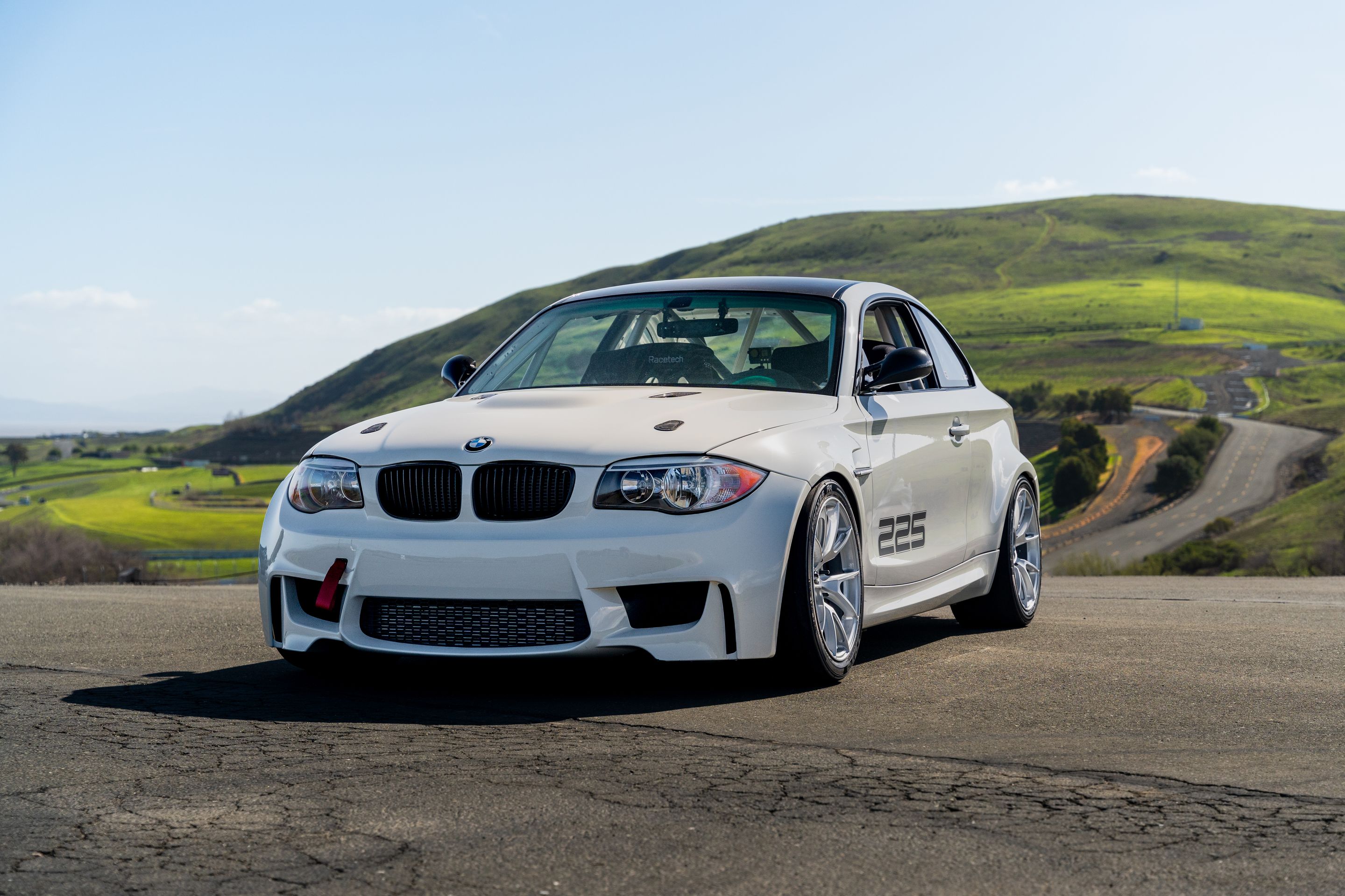 White BMW E82 1M with 18" VS-5 Apex wheels in Race Silver