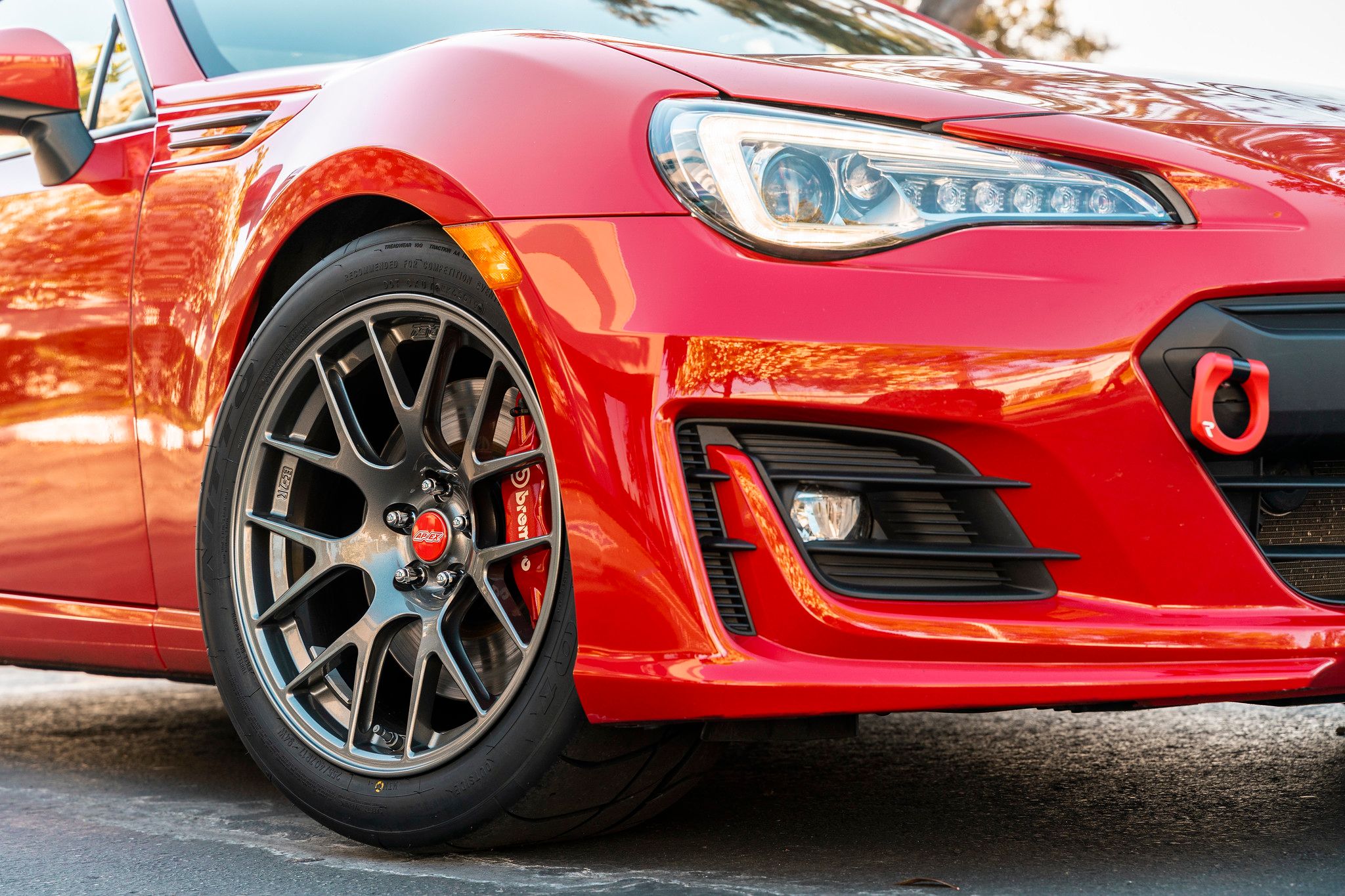 Red Subaru ZC6 / Gen 1 BRZ with 17" EC-7R Apex wheels in Anthracite