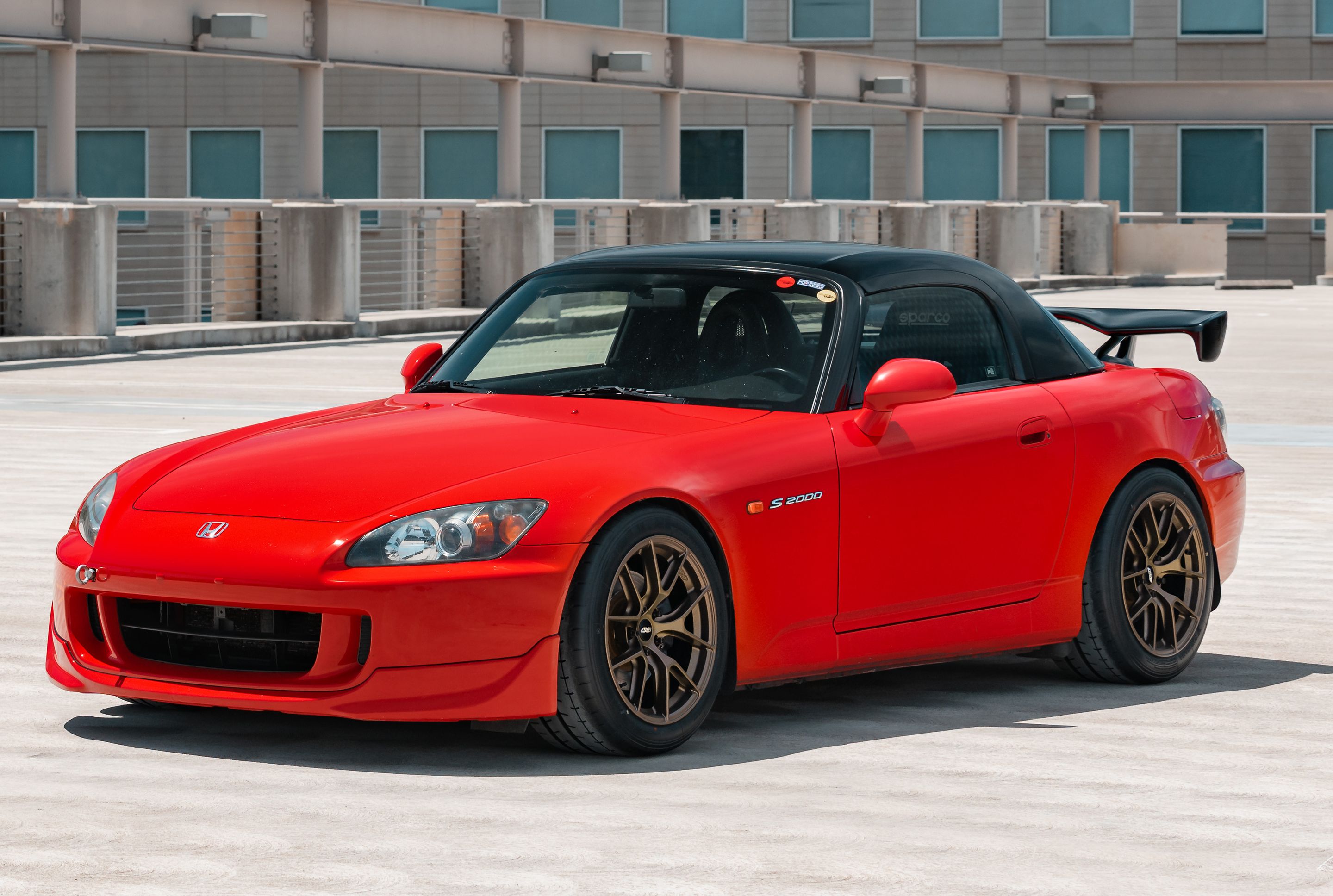 Red Honda S2000 with 17" VS-5RS Apex wheels in Satin Bronze