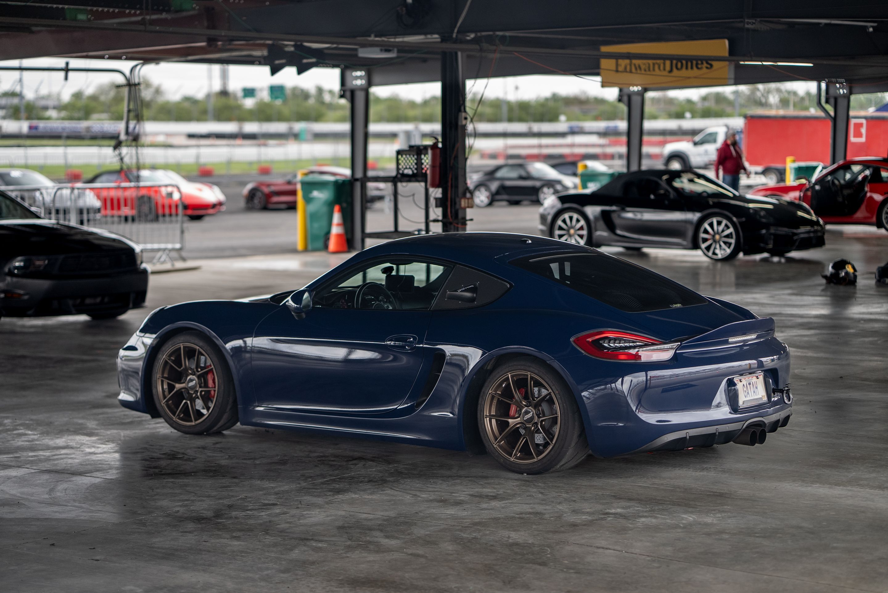 Blue Porsche 981 Cayman GTS with 18" VS-5RS Apex wheels in Satin Bronze
