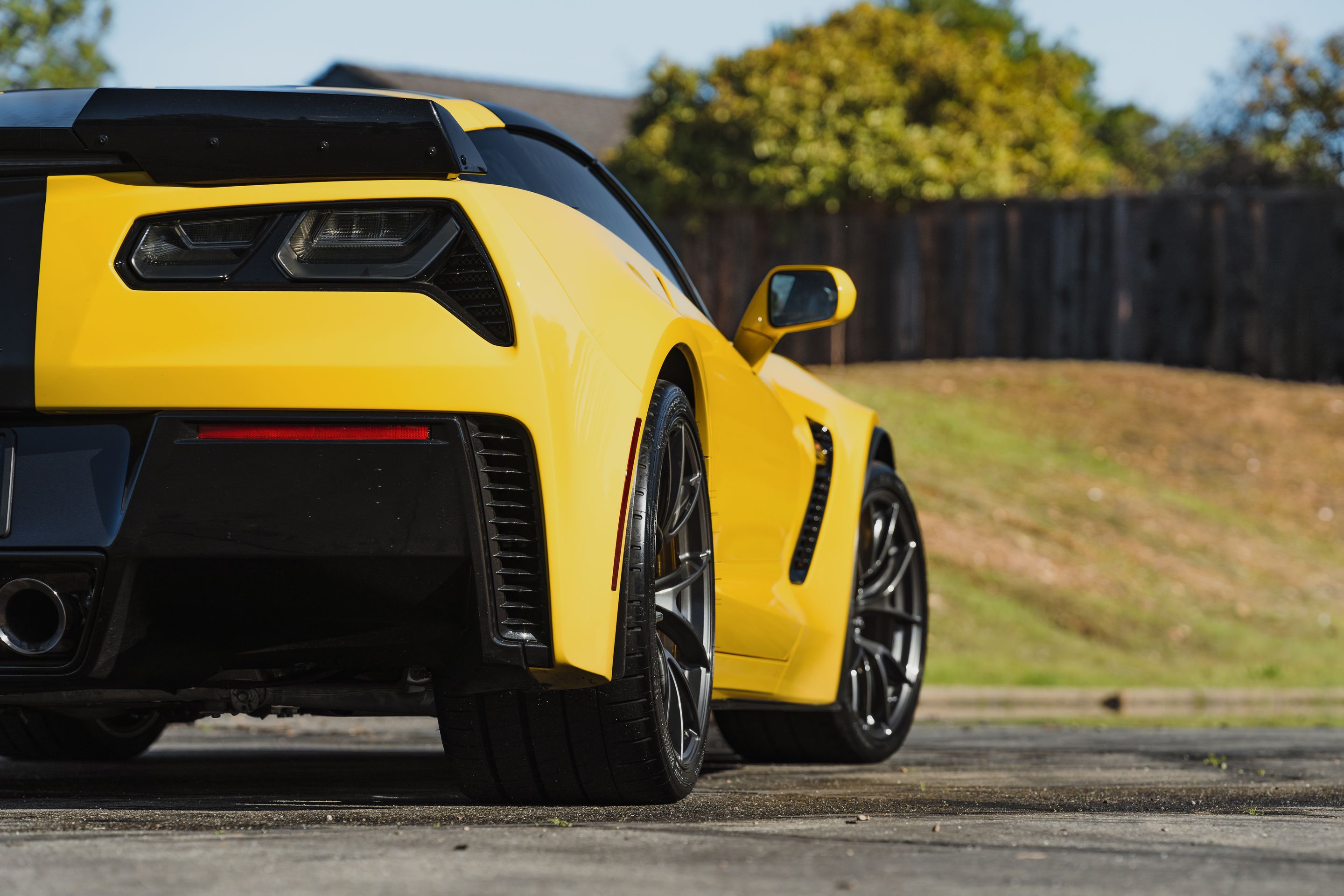 Yellow Chevrolet C7 Corvette Z06 with 19"/20" VS-5RS Apex wheels in Anthracite