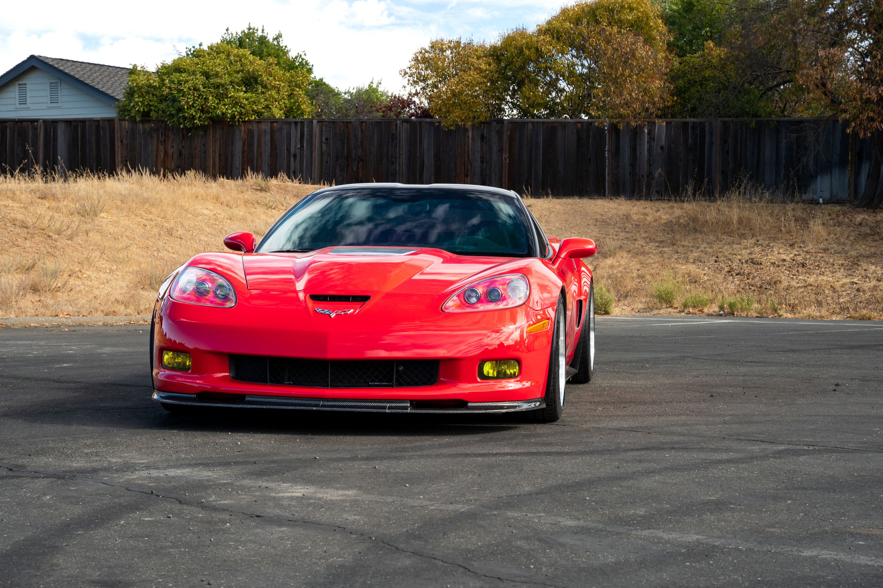 Red Chevrolet C6 Corvette ZR-1 with 18"/19" ML-10RT Apex wheels in Machined Lip Race Silver