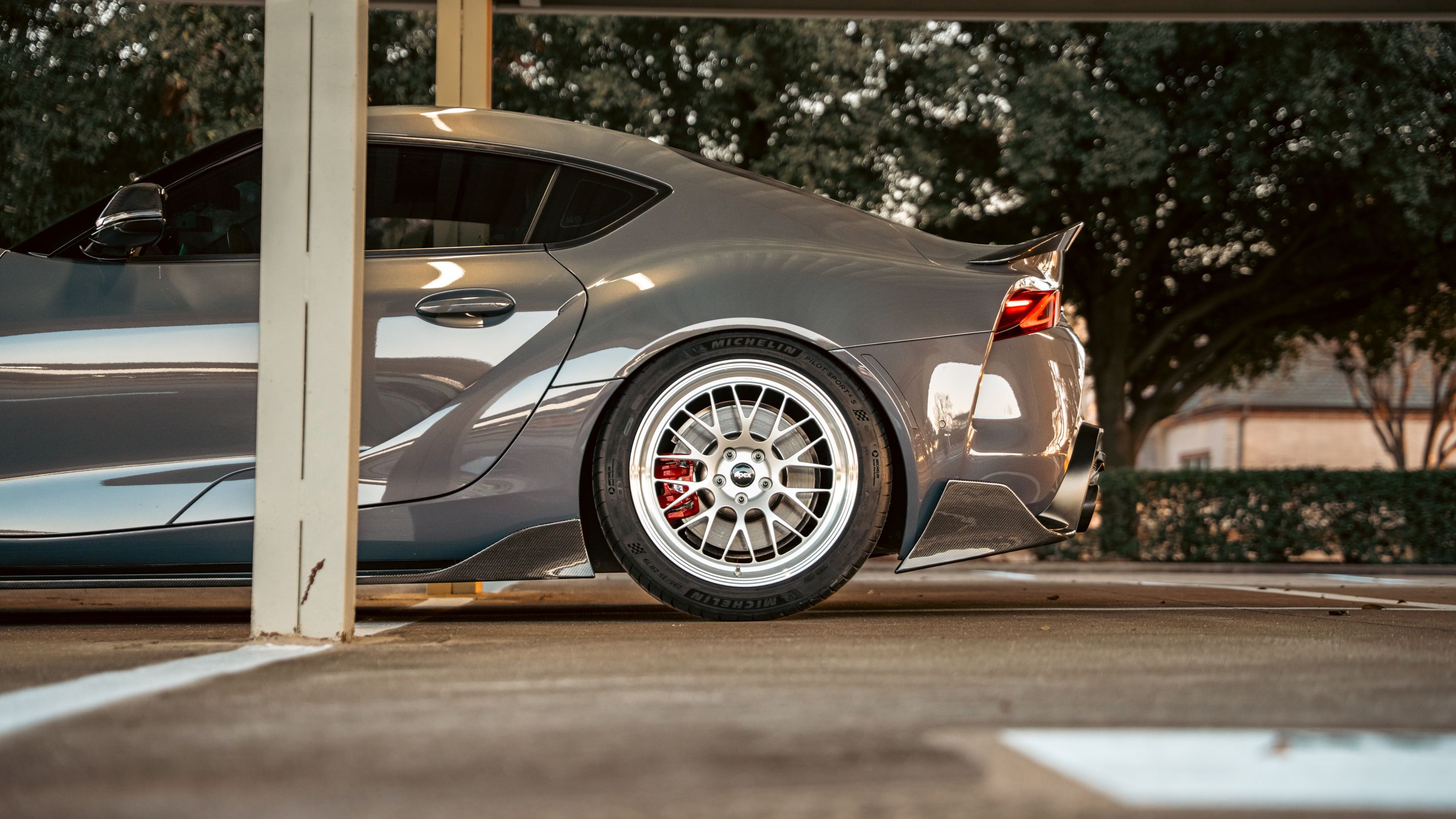 Grey Toyota GR Supra with 19" ML-10RT Apex wheels in Machined Lip Race Silver