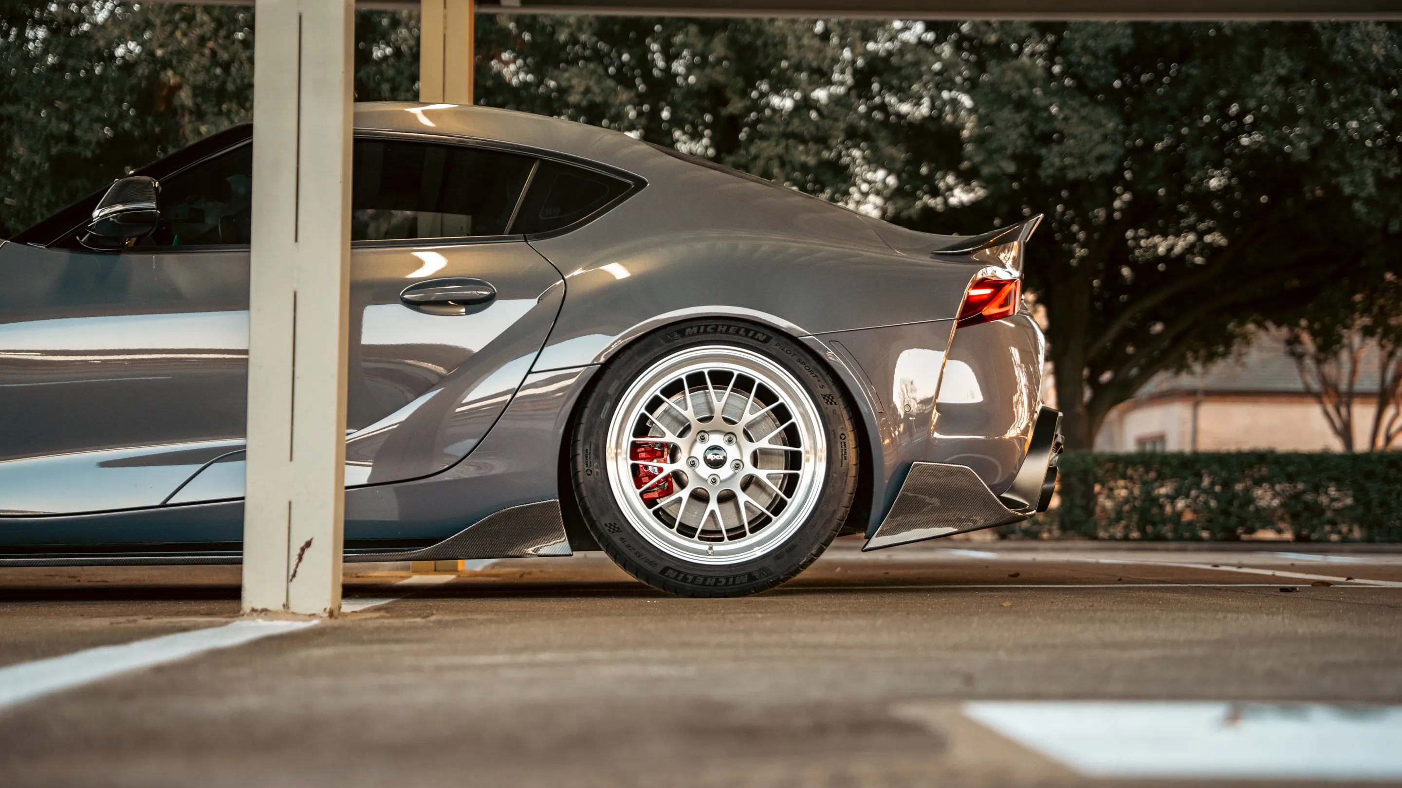 Grey Toyota GR Supra with 19" ML-10RT Apex wheels in Machined Lip Race Silver