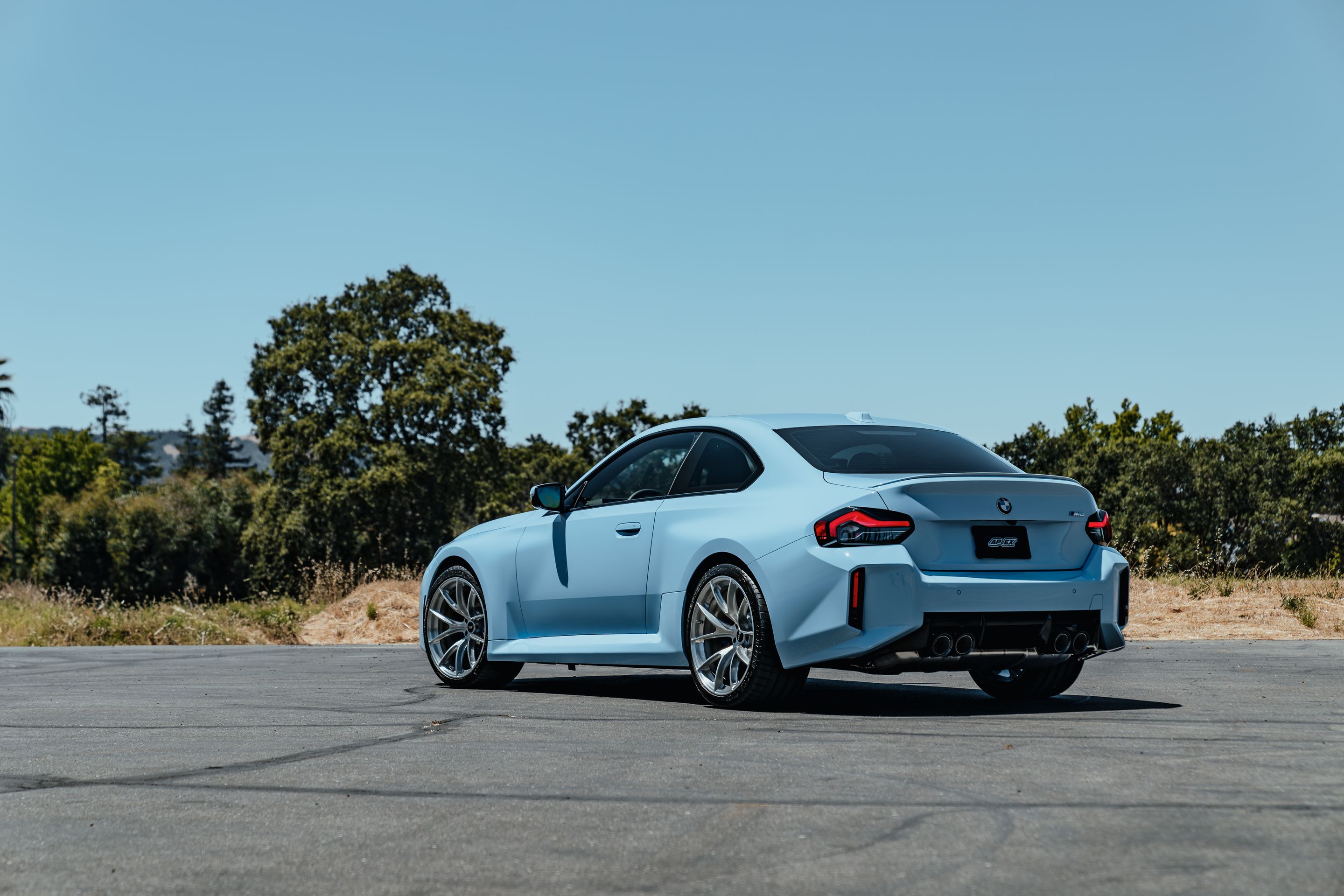 Blue BMW G87 M2 with 20" VS-5RS Apex wheels in Brushed Clear