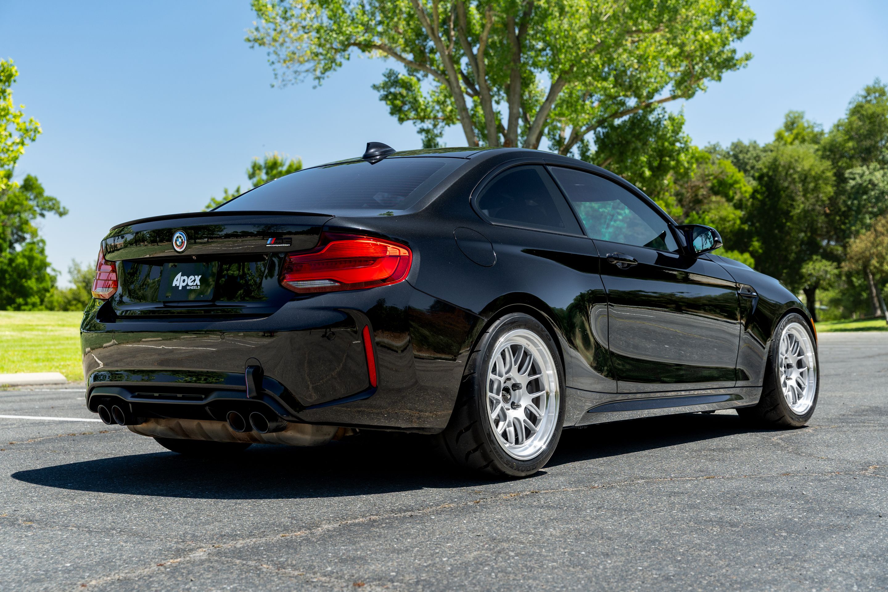 Black BMW F87 M2 with 18" ML-7RT Apex wheels in Machined Lip Race Silver