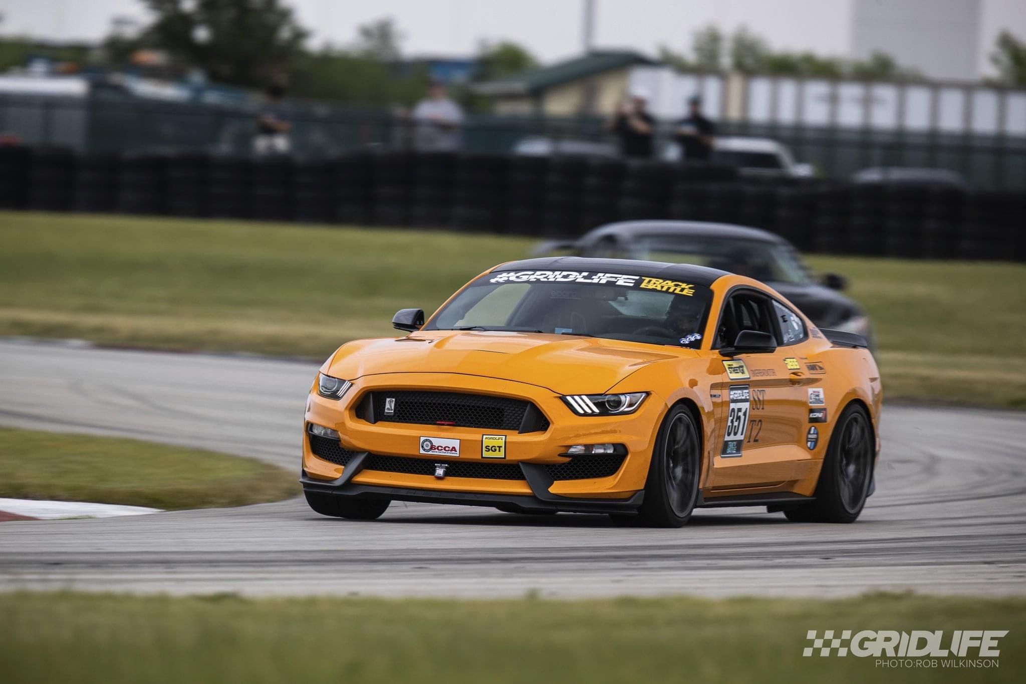 Orange Ford S550 Mustang GT350 with 19" SM-10 Apex wheels in Anthracite