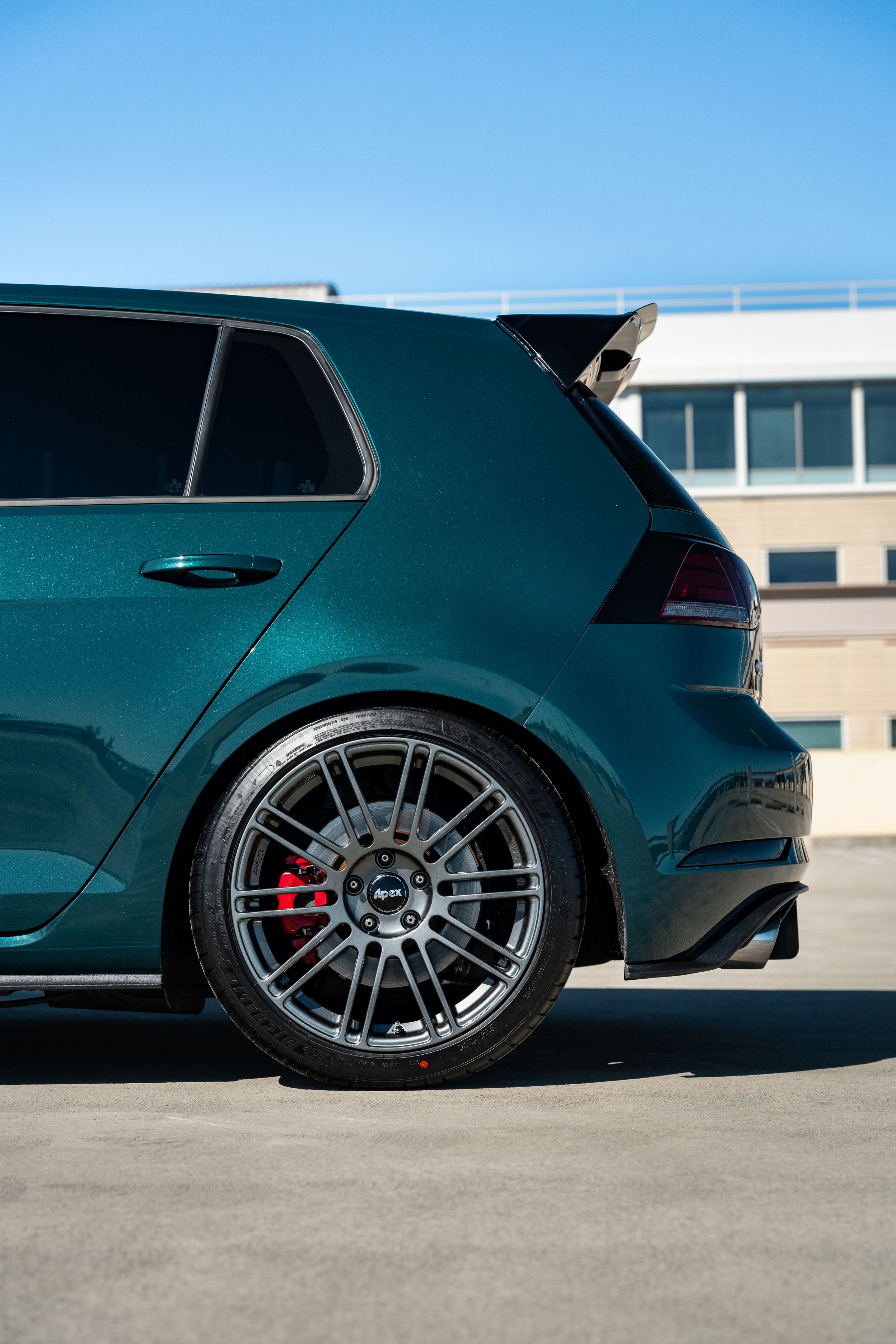 Green VW MK7 GTI with 18" TC-10RT Apex wheels in Anthracite