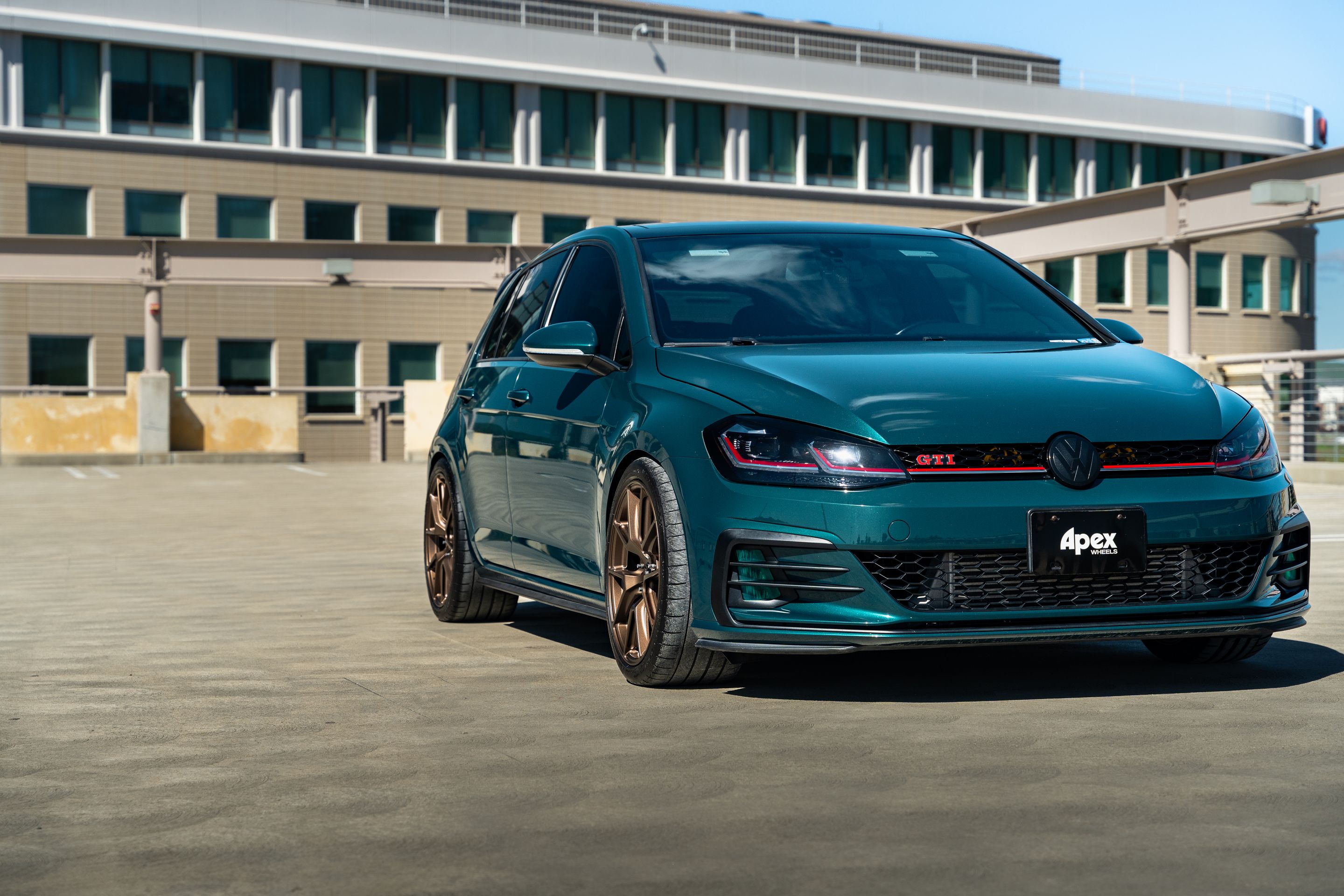 Green VW MK7 GTI with 18" VS-5 Apex wheels in Satin Bronze