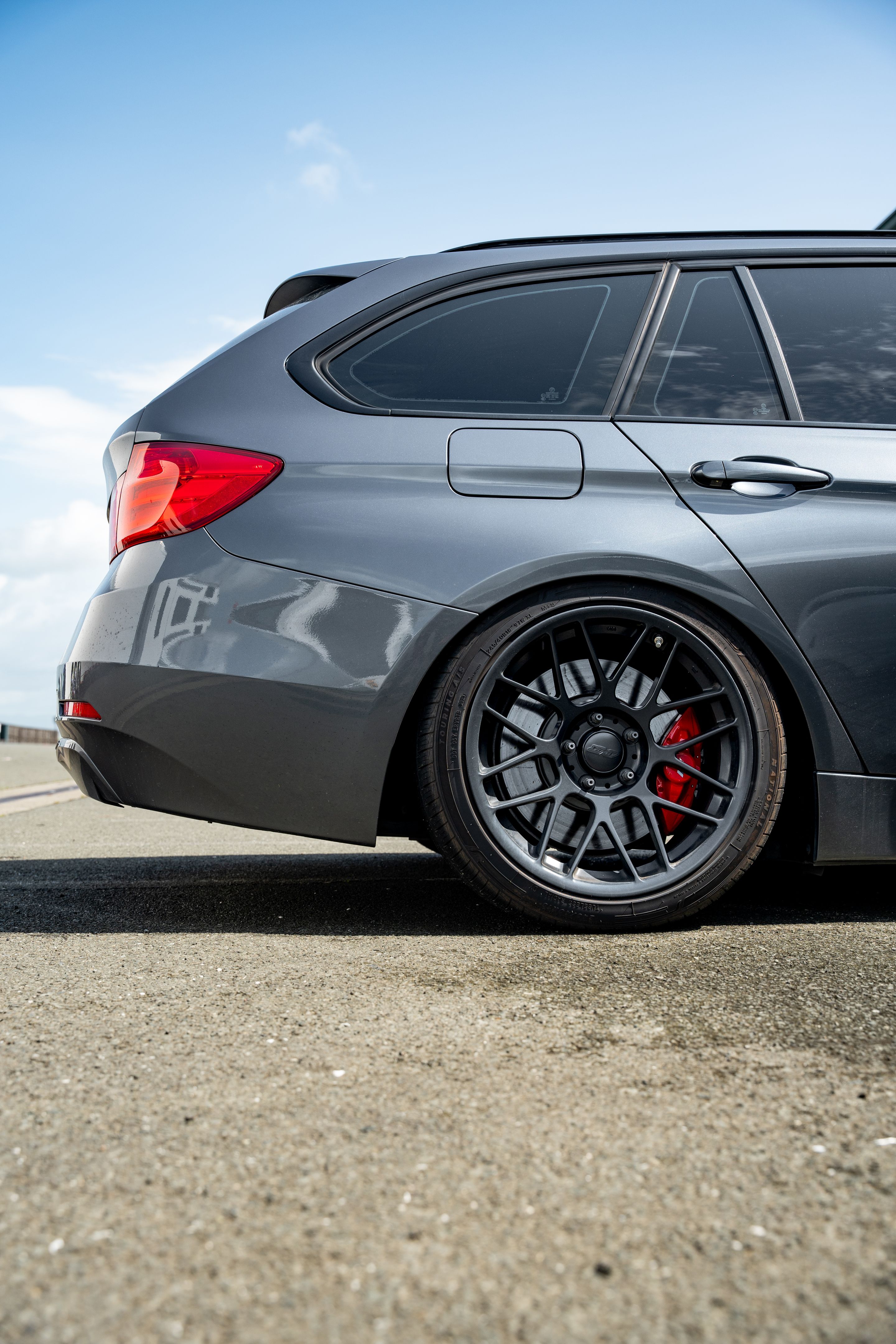 Grey BMW F31 Wagon 3 Series with 18" ARC-8 Apex wheels in Satin Black