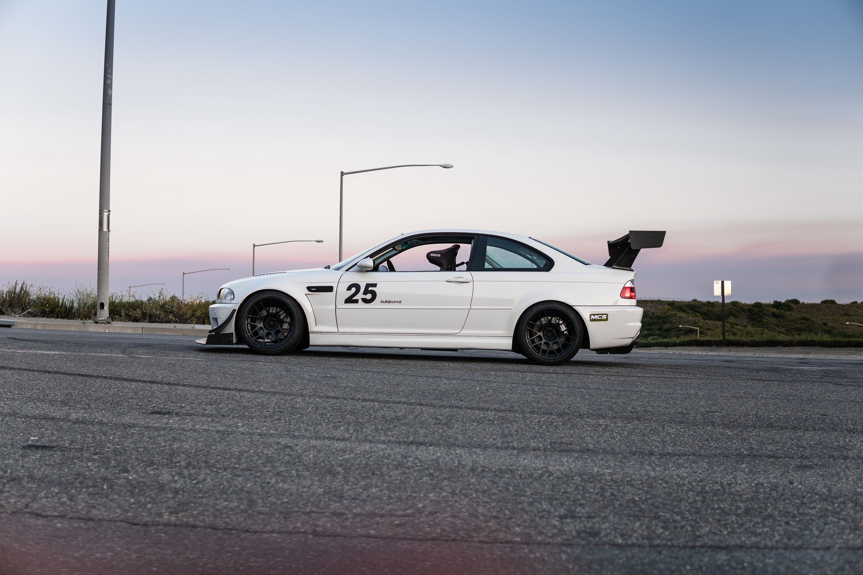 White BMW E46 M3 with 18" ARC-8R Apex wheels in Satin Black