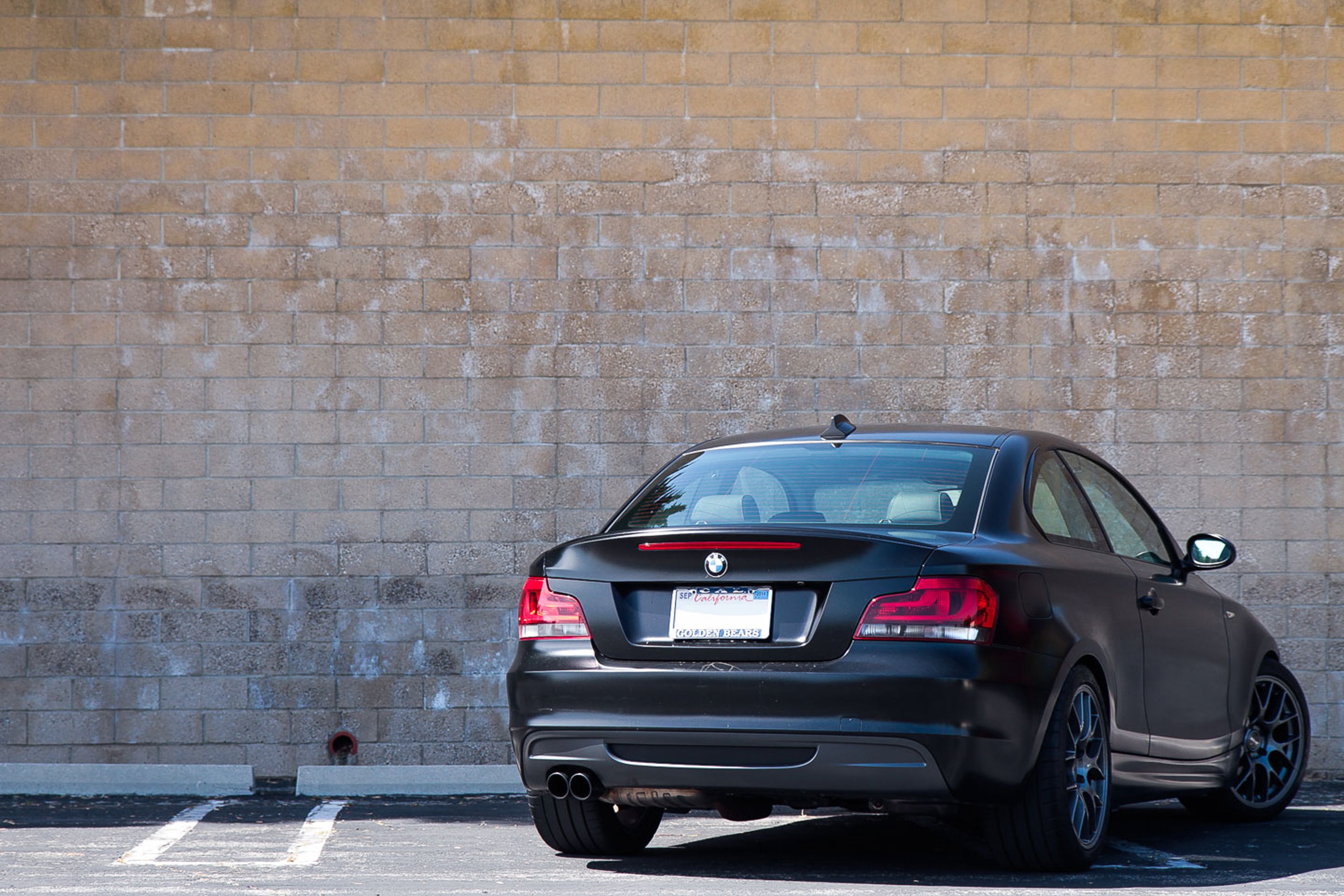 Black BMW E82 Coupe 1 Series with 18" EC-7 Apex wheels in Anthracite