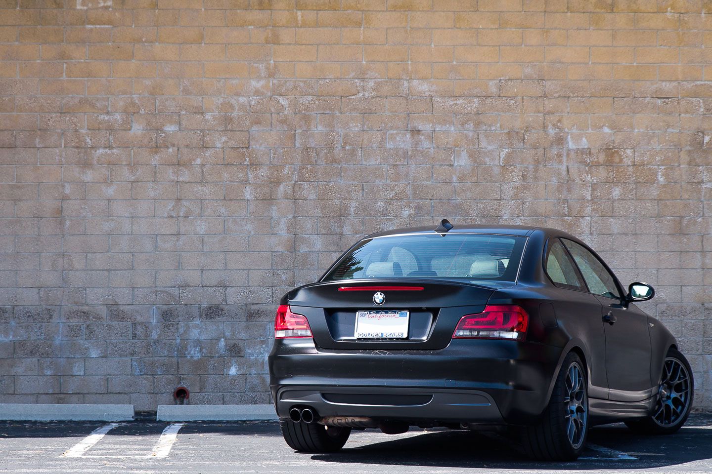 Black BMW E82 Coupe 1 Series with 18" EC-7 Apex wheels in Anthracite