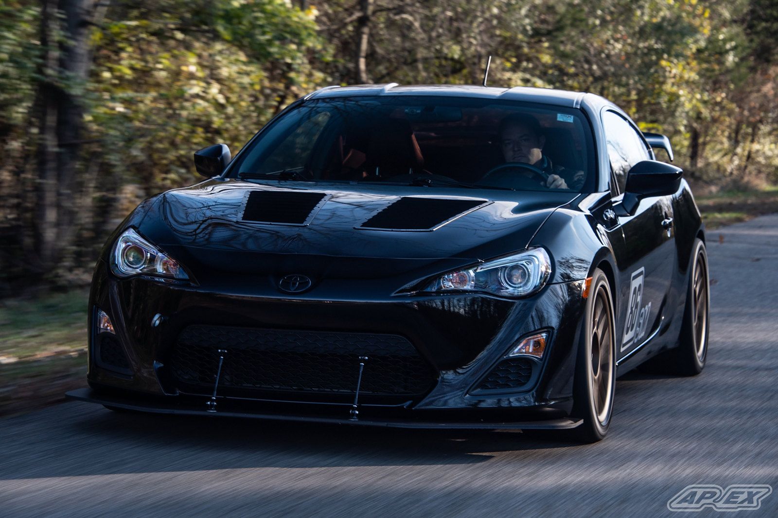 Black Scion FR-S with 17" ARC-8 Apex wheels in Satin Bronze