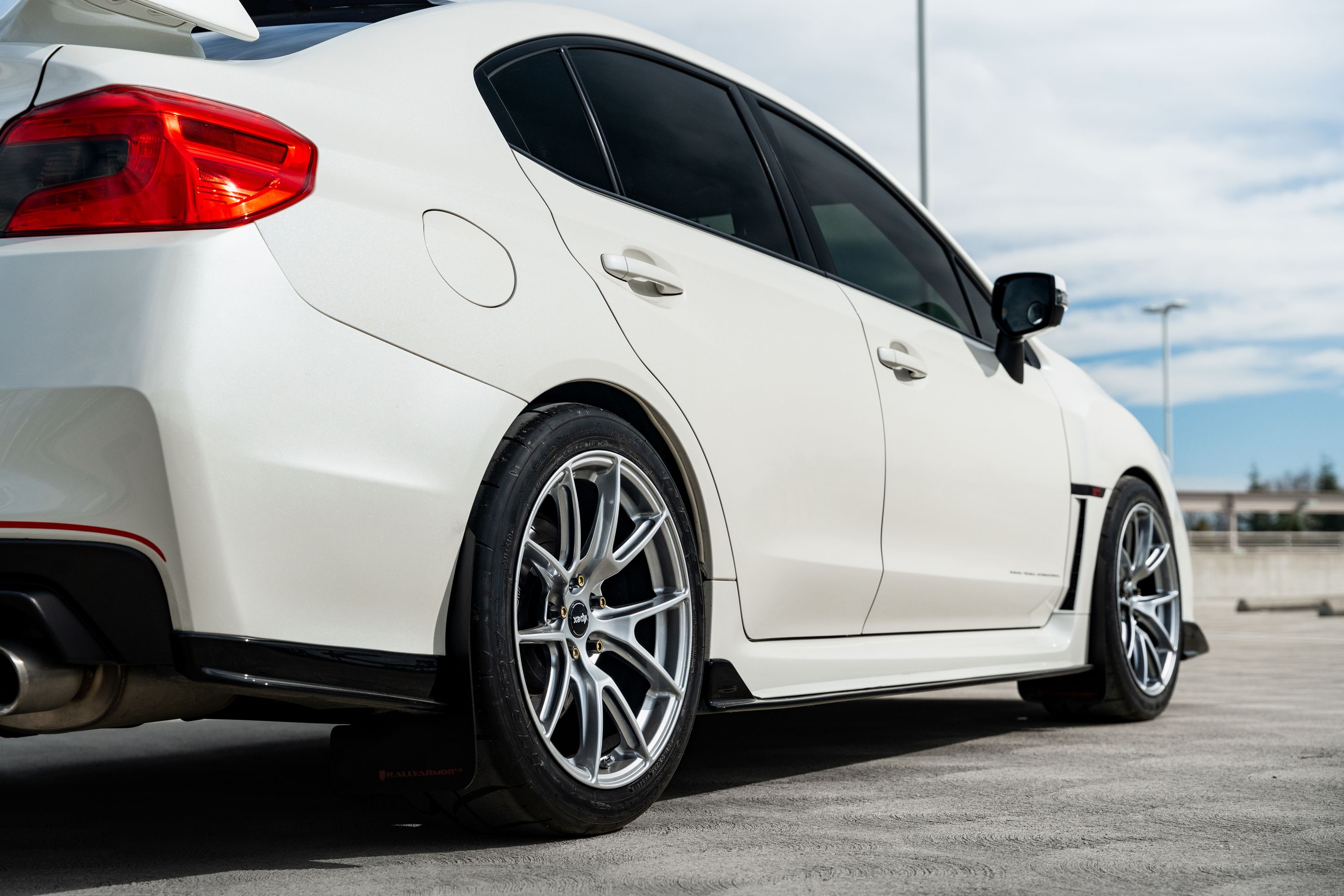 White Subaru VA WRX STI with 18" VS-5 Apex wheels in Hyper Black