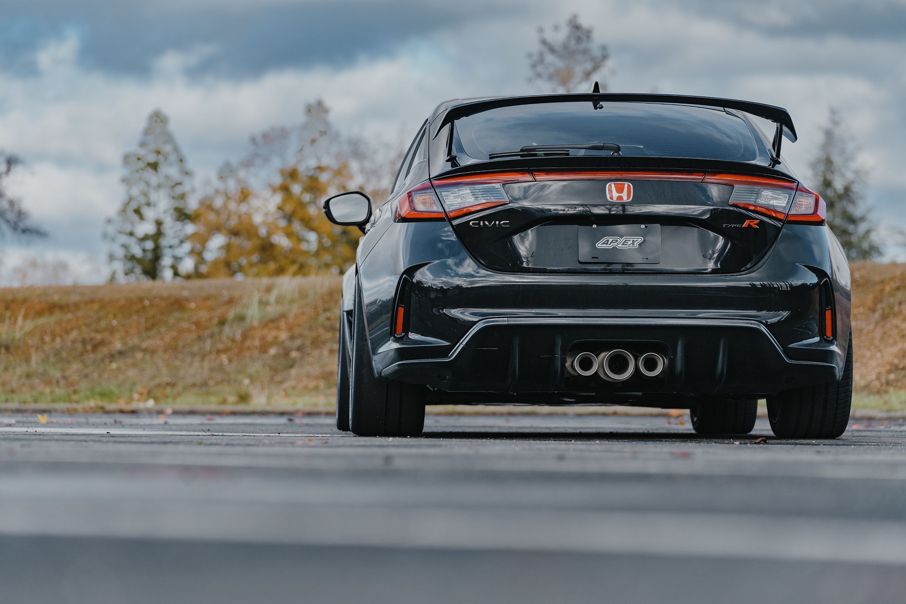 Black Honda FL5 Civic Type-R with 18" EC-7 Apex wheels in Race Silver