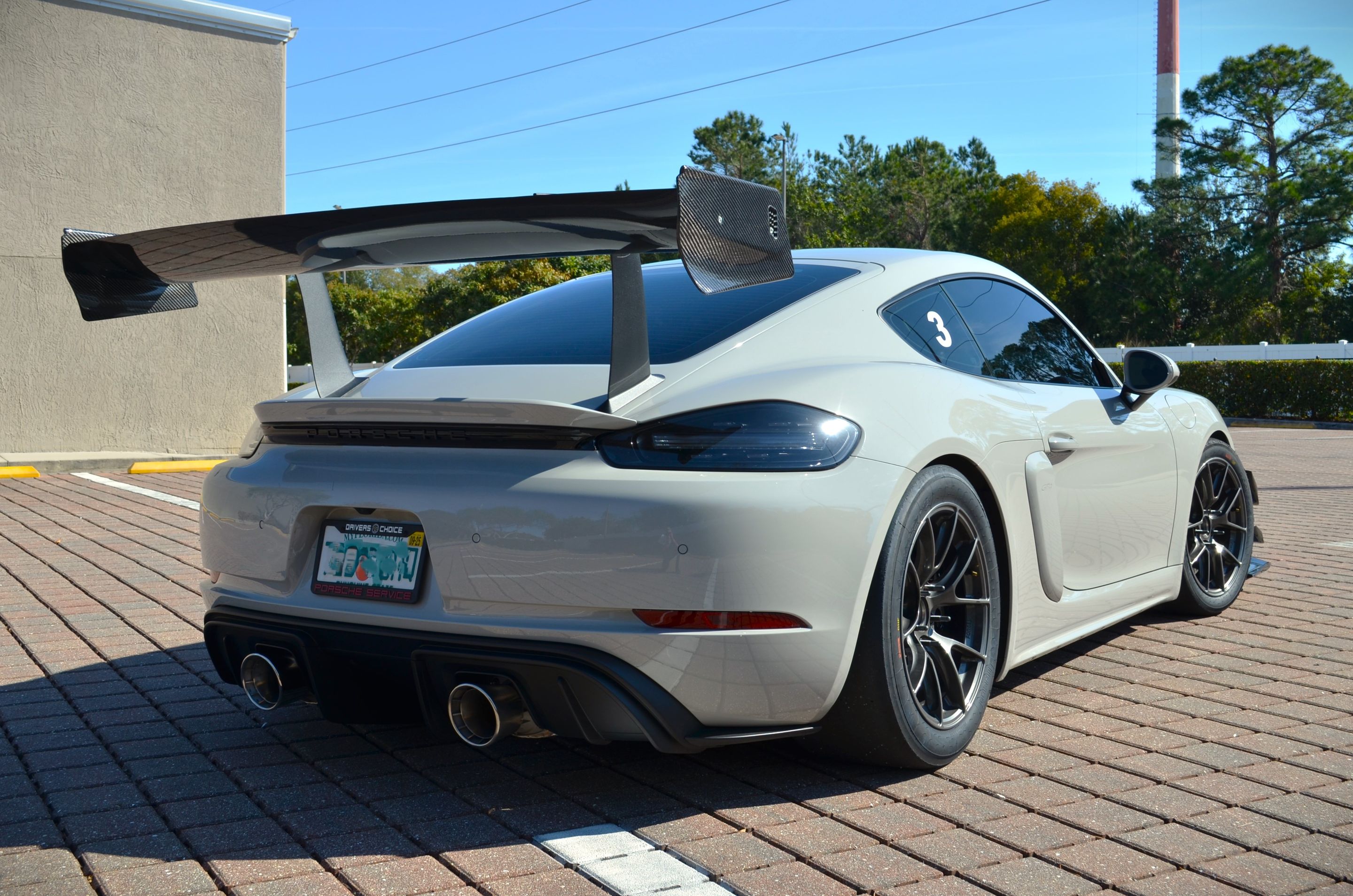 Grey Porsche 718 Cayman GT4 with 18" VS-5RS Apex wheels in Anthracite