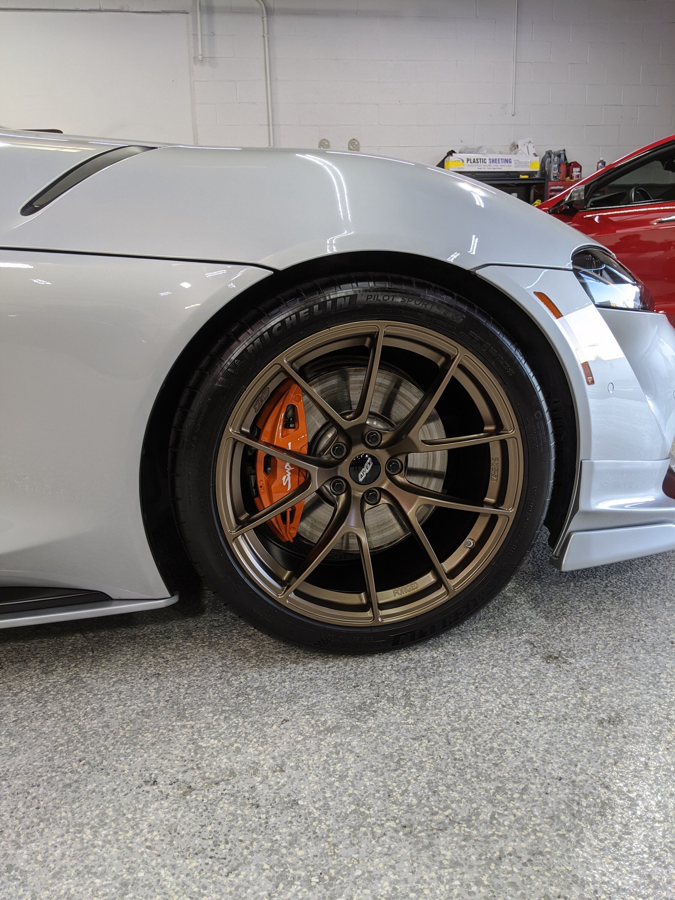 Silver Toyota GR Supra with 19" VS-5RS Apex wheels in Satin Bronze