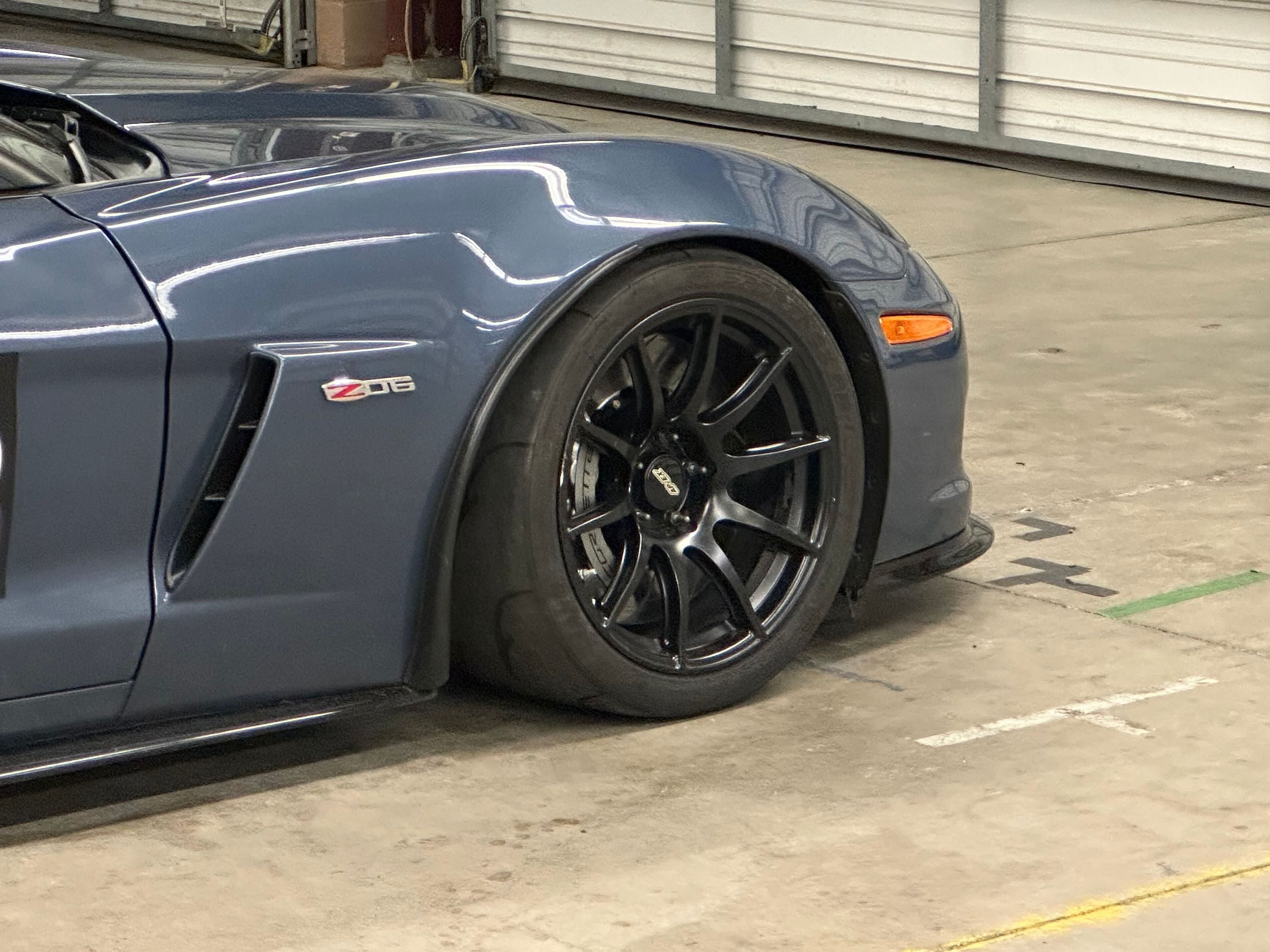 Blue Chevrolet C6 Corvette Z06 with 18" SM-10 Apex wheels in Satin Black