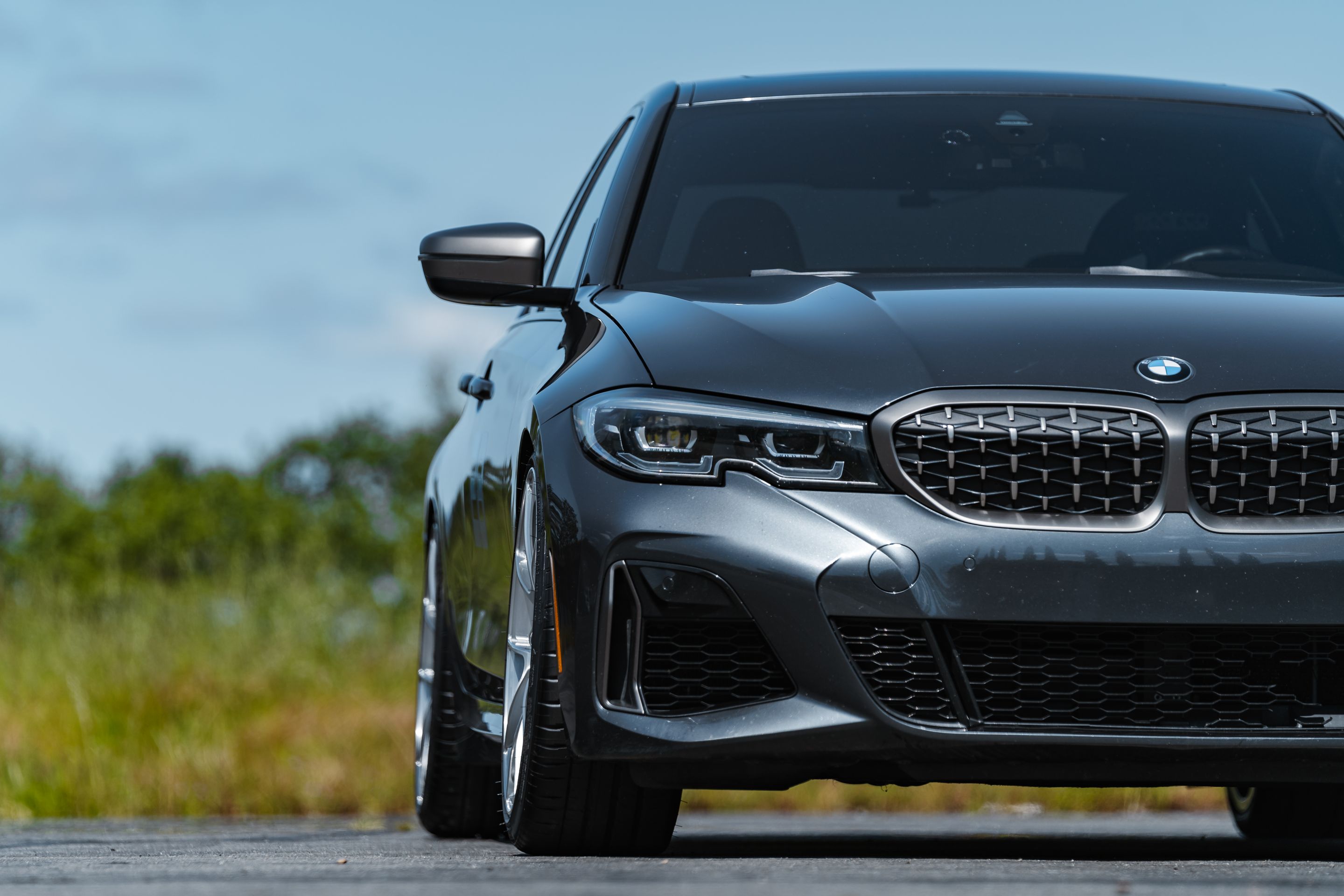 Grey BMW G20 Sedan 3 Series with 20" VS-5RS Apex wheels in Brushed Clear