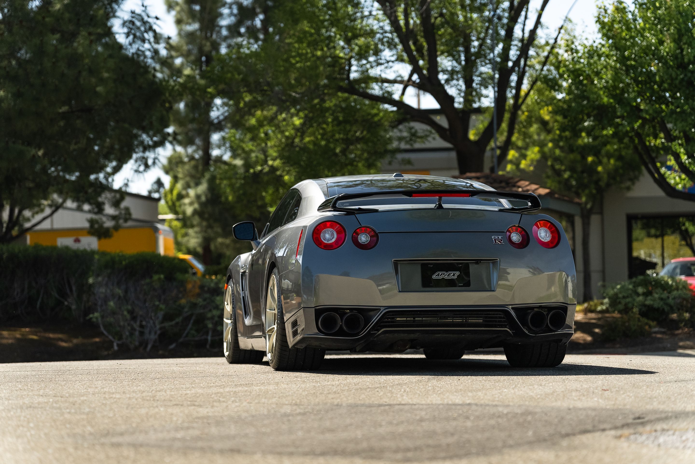 Grey Nissan R35 GT-R Base with 20" VS-5RS Apex wheels in Motorsport Gold