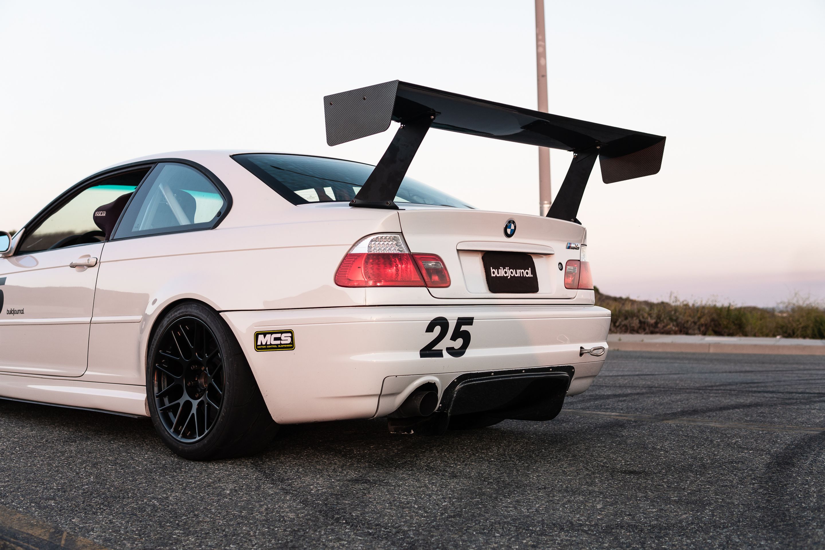 White BMW E46 M3 with 18" ARC-8R Apex wheels in Satin Black