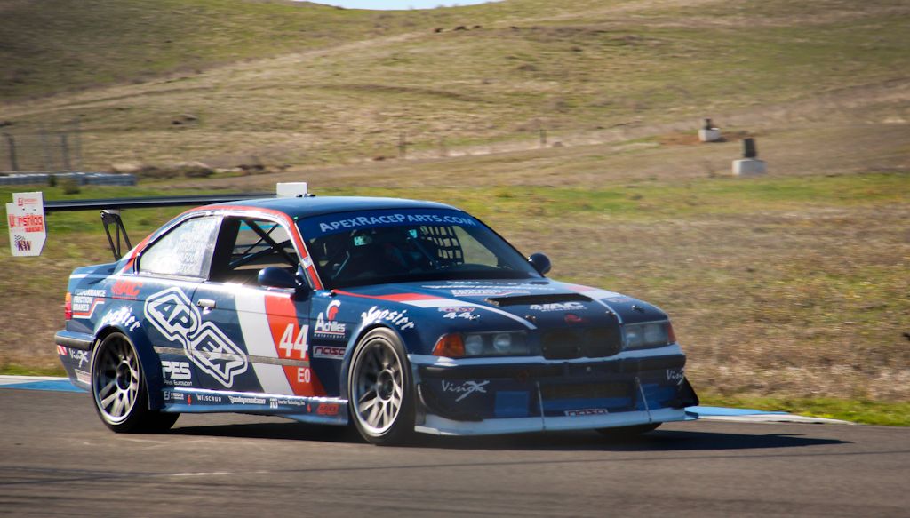 Blue BMW E36 M3 with 18" ARC-8 Apex wheels in Hyper Black