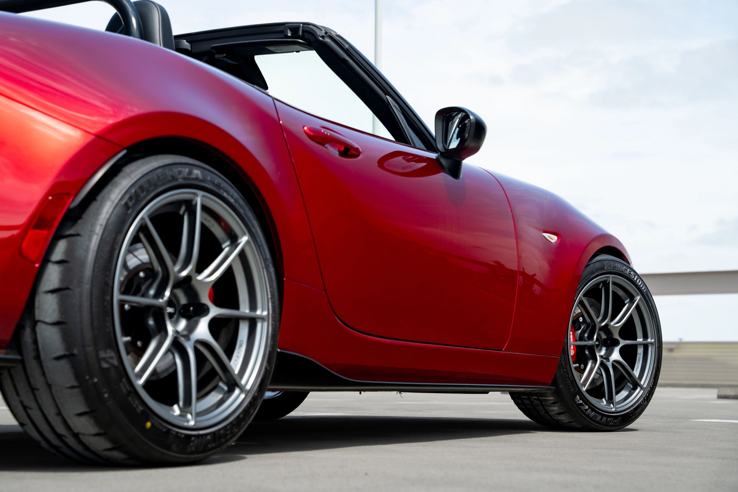 Red Mazda ND MX-5 Miata with 17" SM-8RS Apex wheels in Anthracite