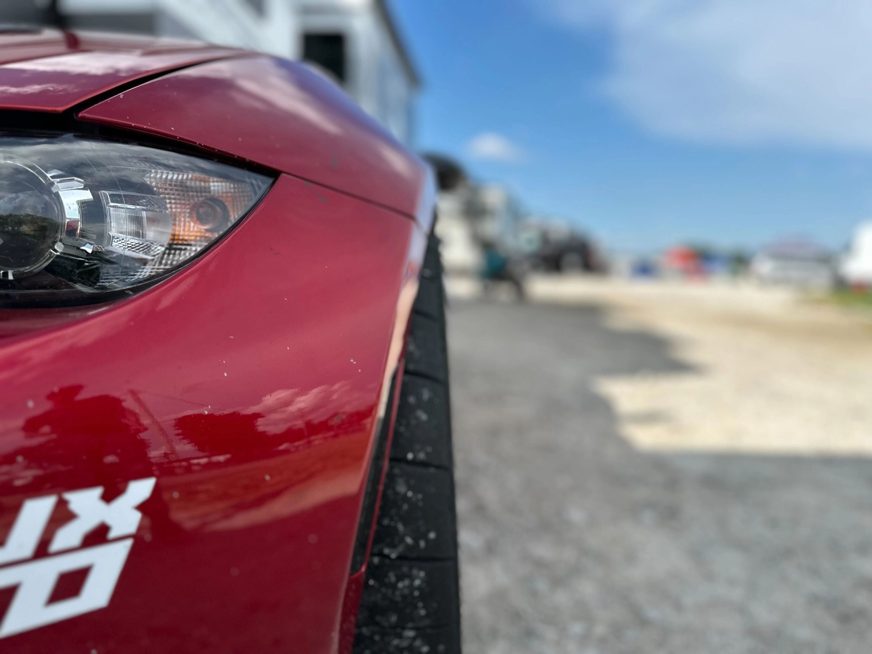 Red Mazda ND MX-5 Miata with 17" SM-8RS Apex wheels in Satin Bronze