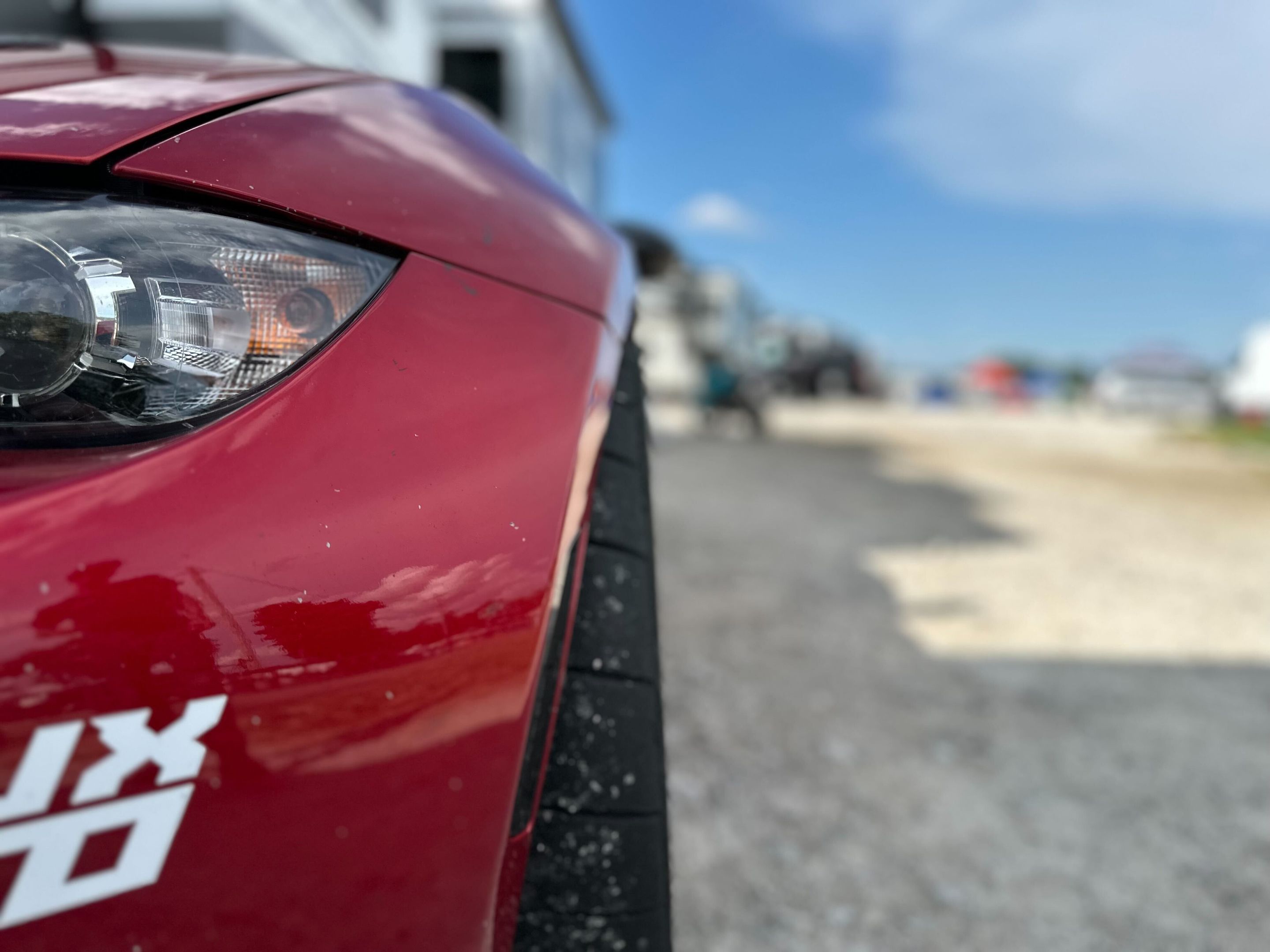 Red Mazda ND MX-5 Miata with 17" SM-8RS Apex wheels in Satin Bronze