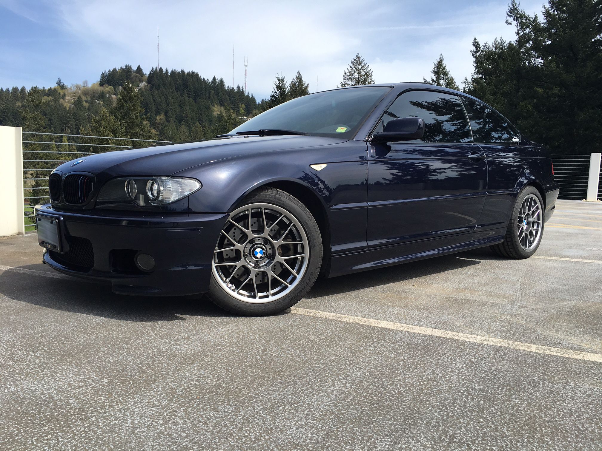 Blue BMW E46 3 Series with 17" ARC-8 Apex wheels in Hyper Black