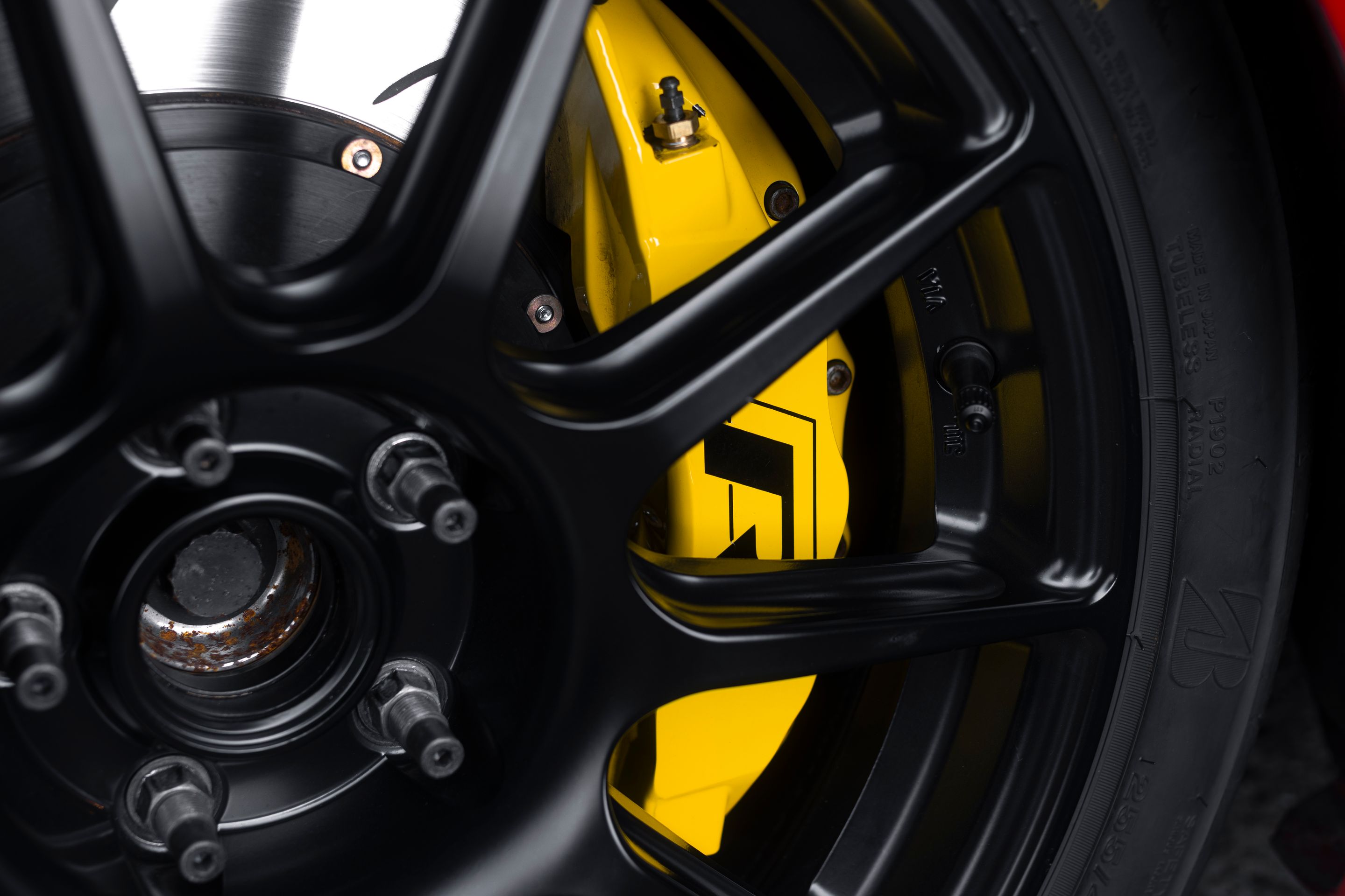 Red VW MK5 Golf with 17" SM-10 Apex wheels in Satin Black