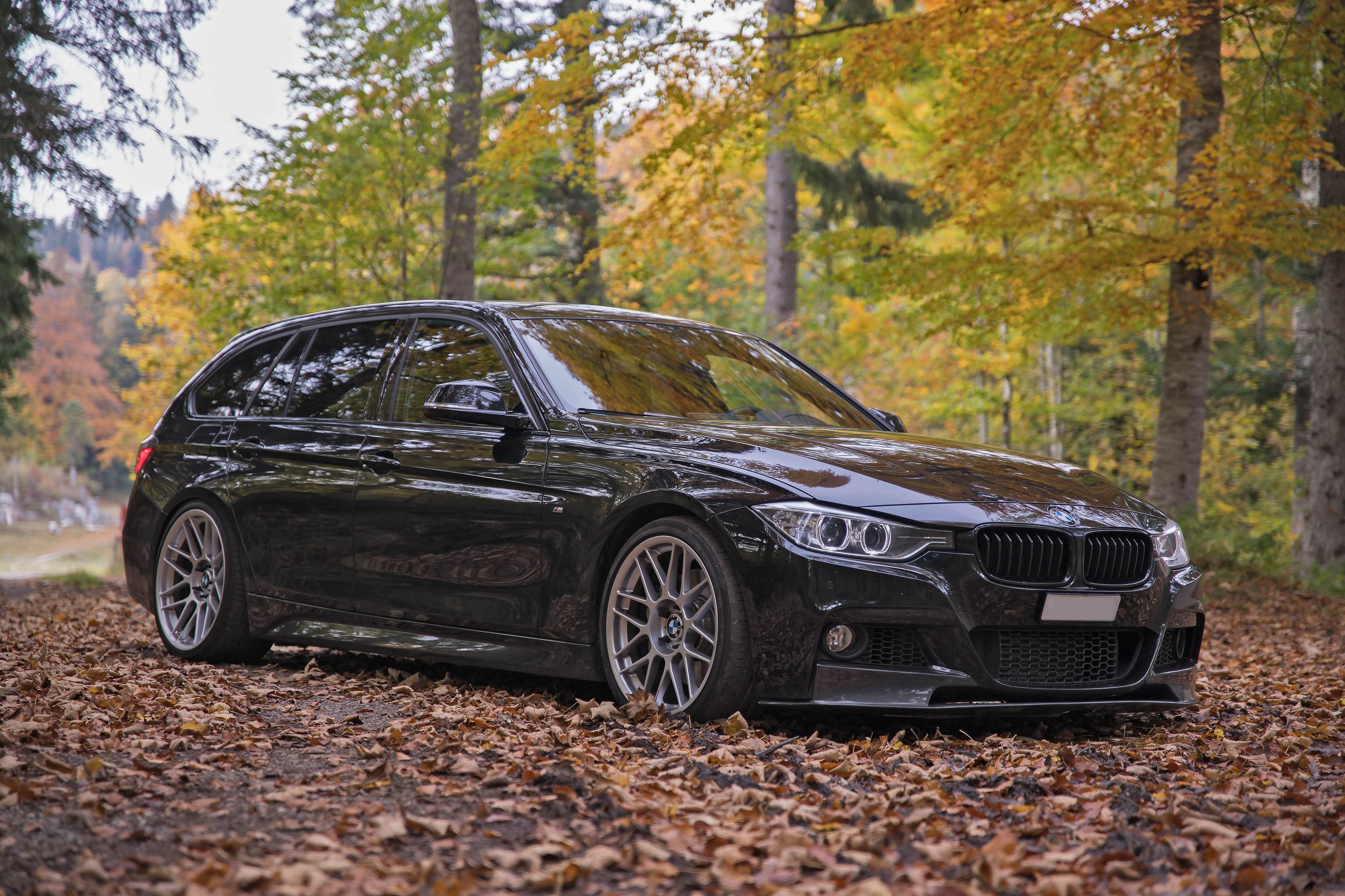 Black BMW F31 Wagon 3 Series with 19" ARC-8 Apex wheels in Race Silver