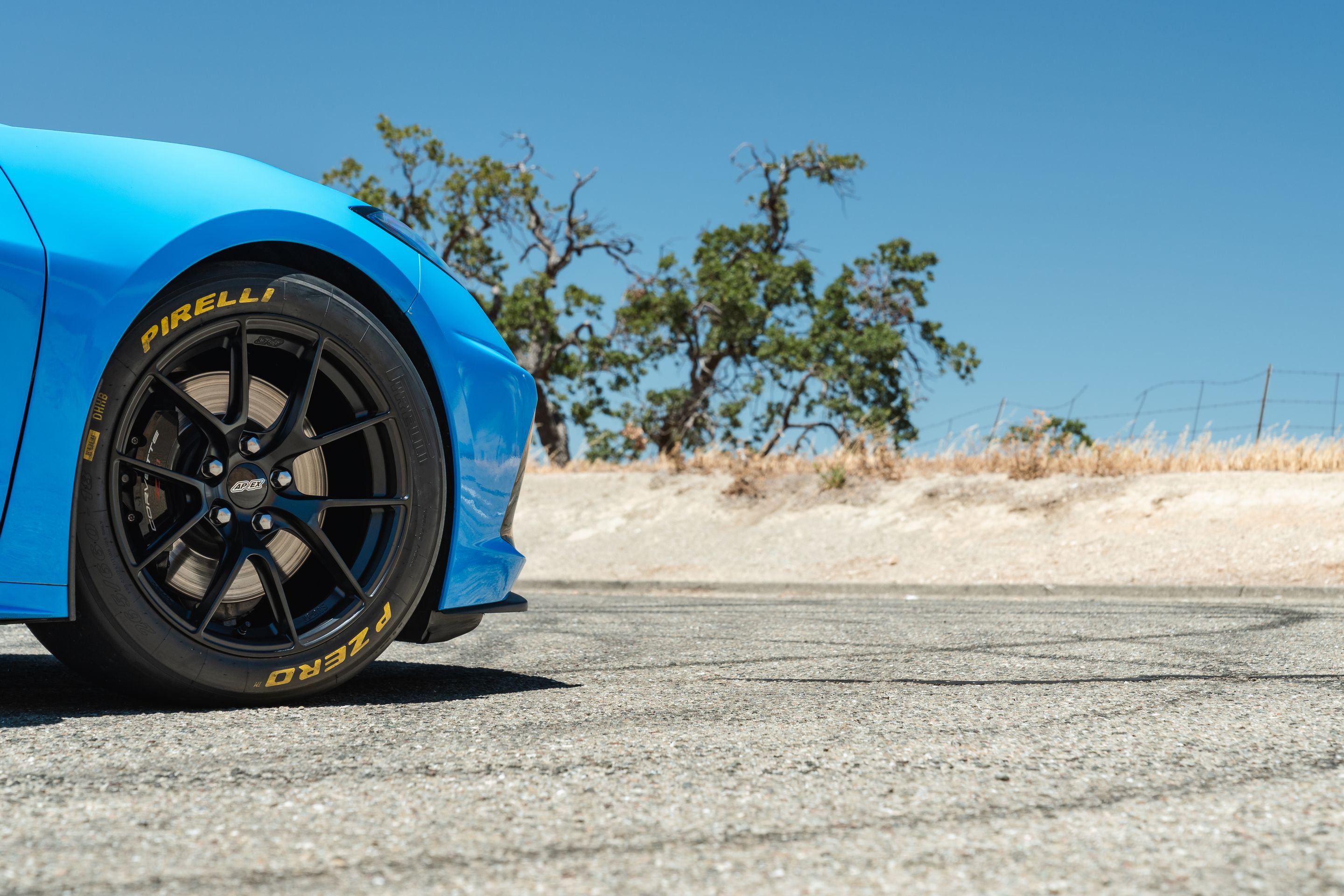Blue Chevrolet C8 Corvette Stingray/Z51 with 18" VS-5RS Apex wheels in Satin Black