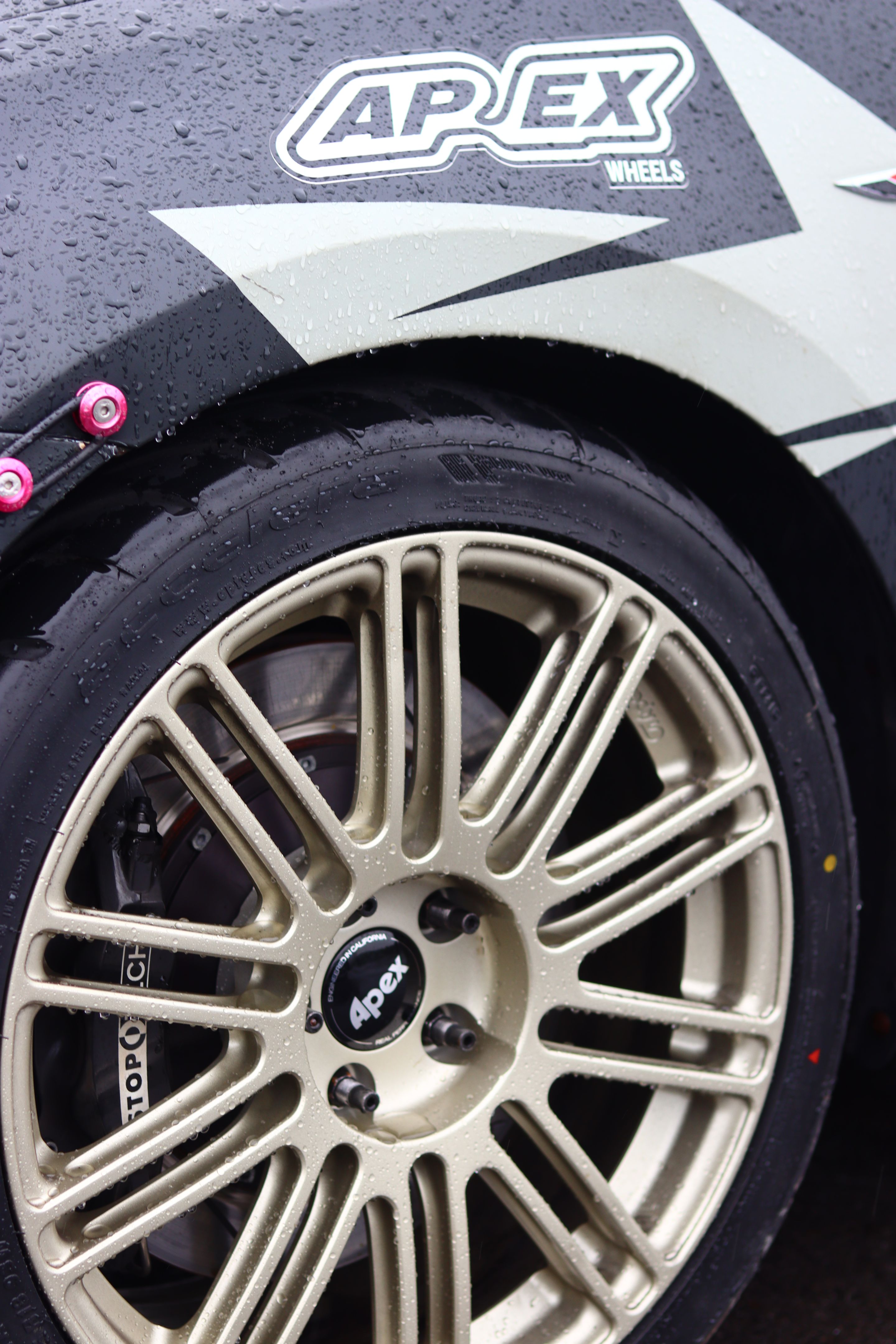 Race Livery VW MK7 GTI with 18" TC-10RT Apex wheels in Motorsport Gold