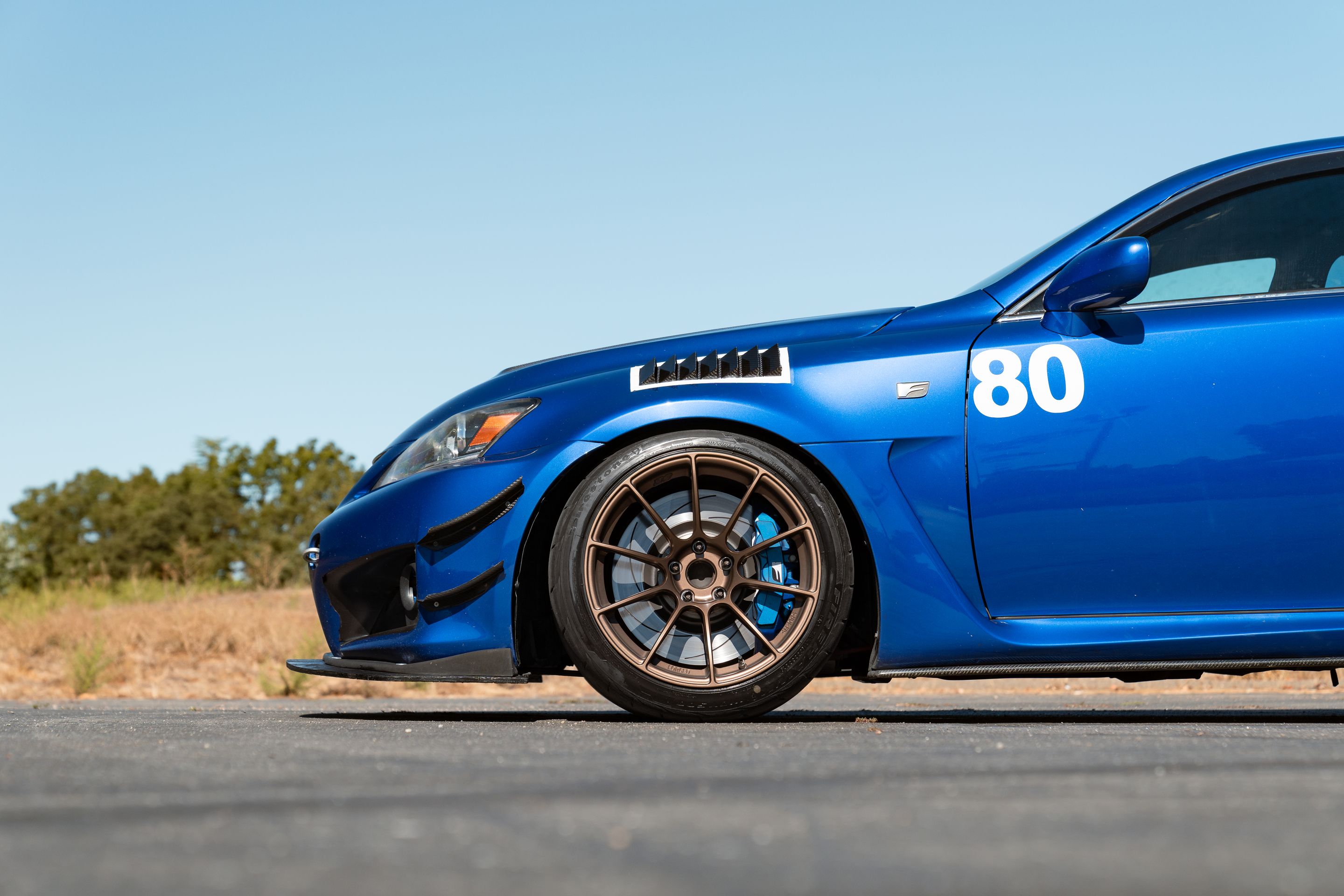 Blue Lexus USE20 IS-F with 18" SM-10RS Apex wheels in Satin Bronze