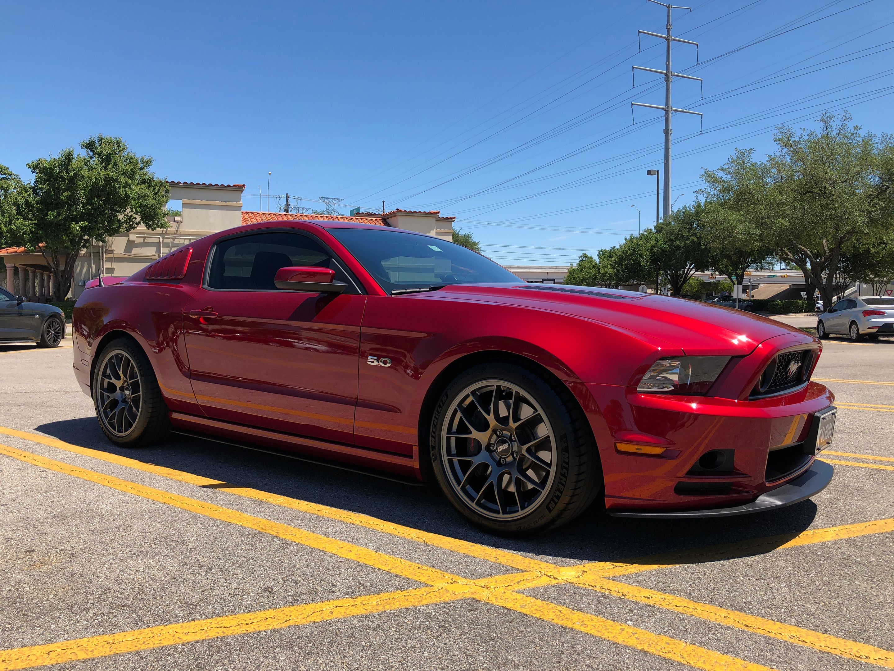 Red Ford S197 Mustang GT with 19" EC-7 Apex wheels in Anthracite
