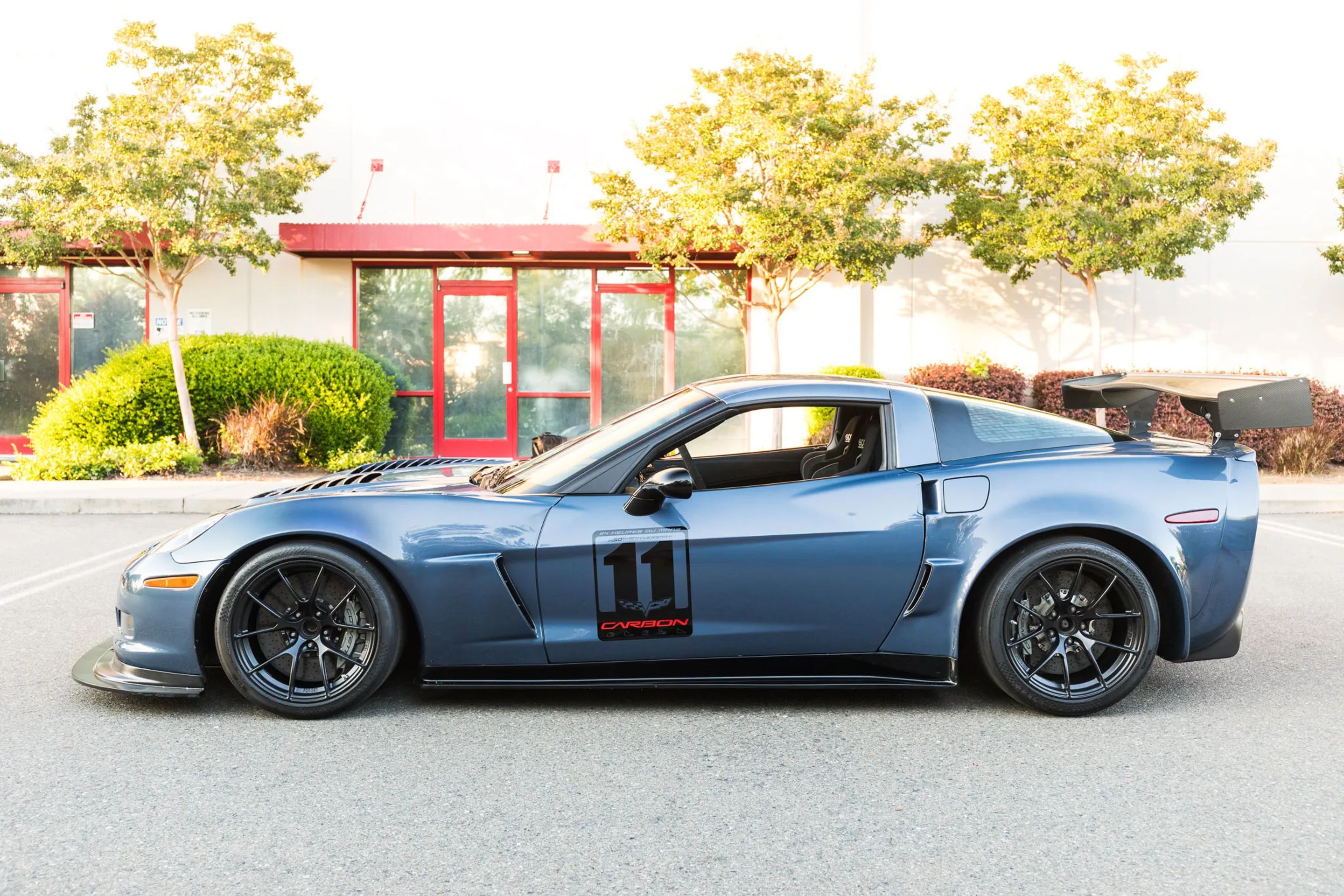 Blue Chevrolet C6 Corvette Z06 with 18" VS-5RS Apex wheels in Satin Black