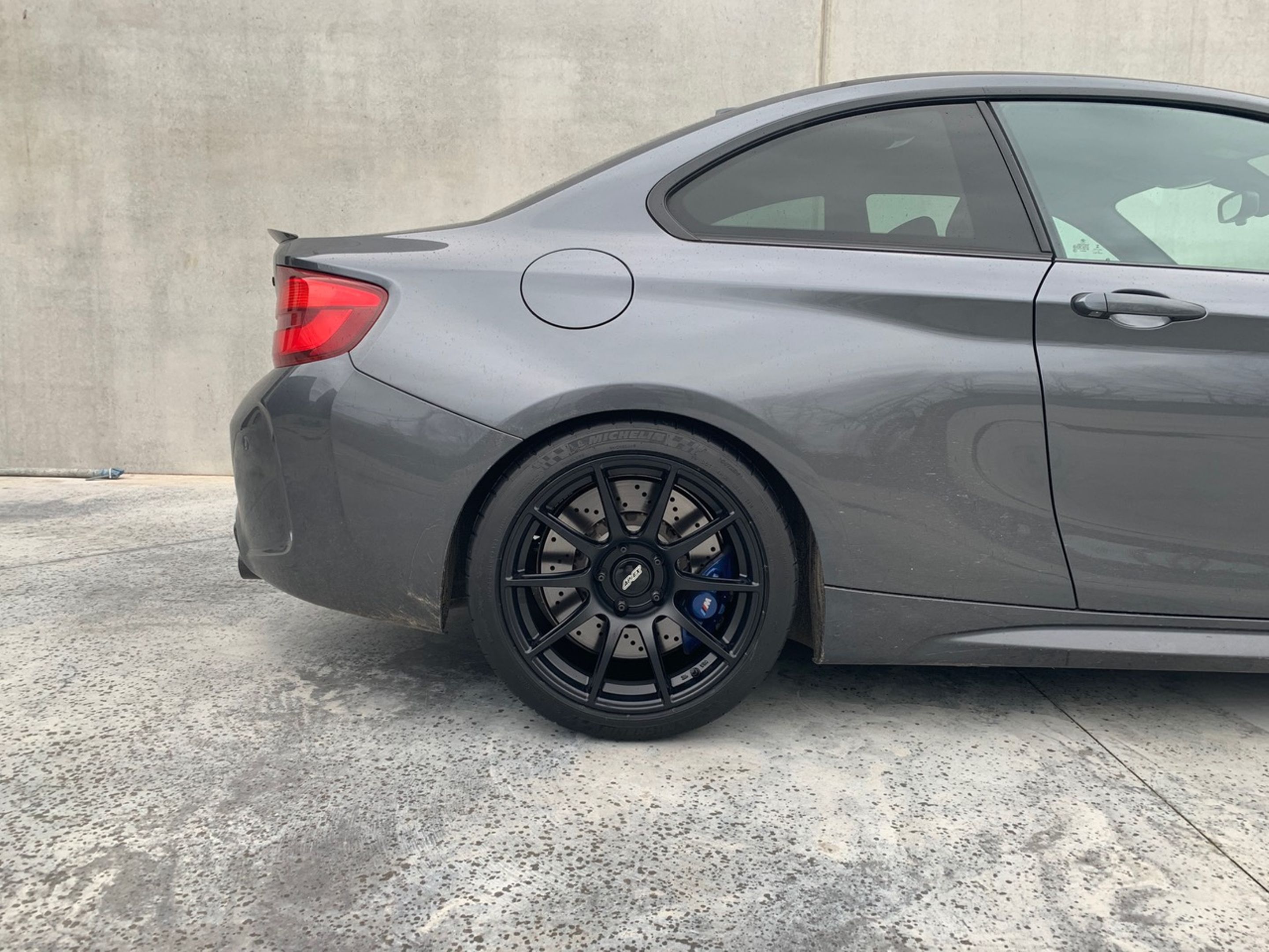 Grey BMW F87 M2 with 18" SM-10 Apex wheels in Satin Black