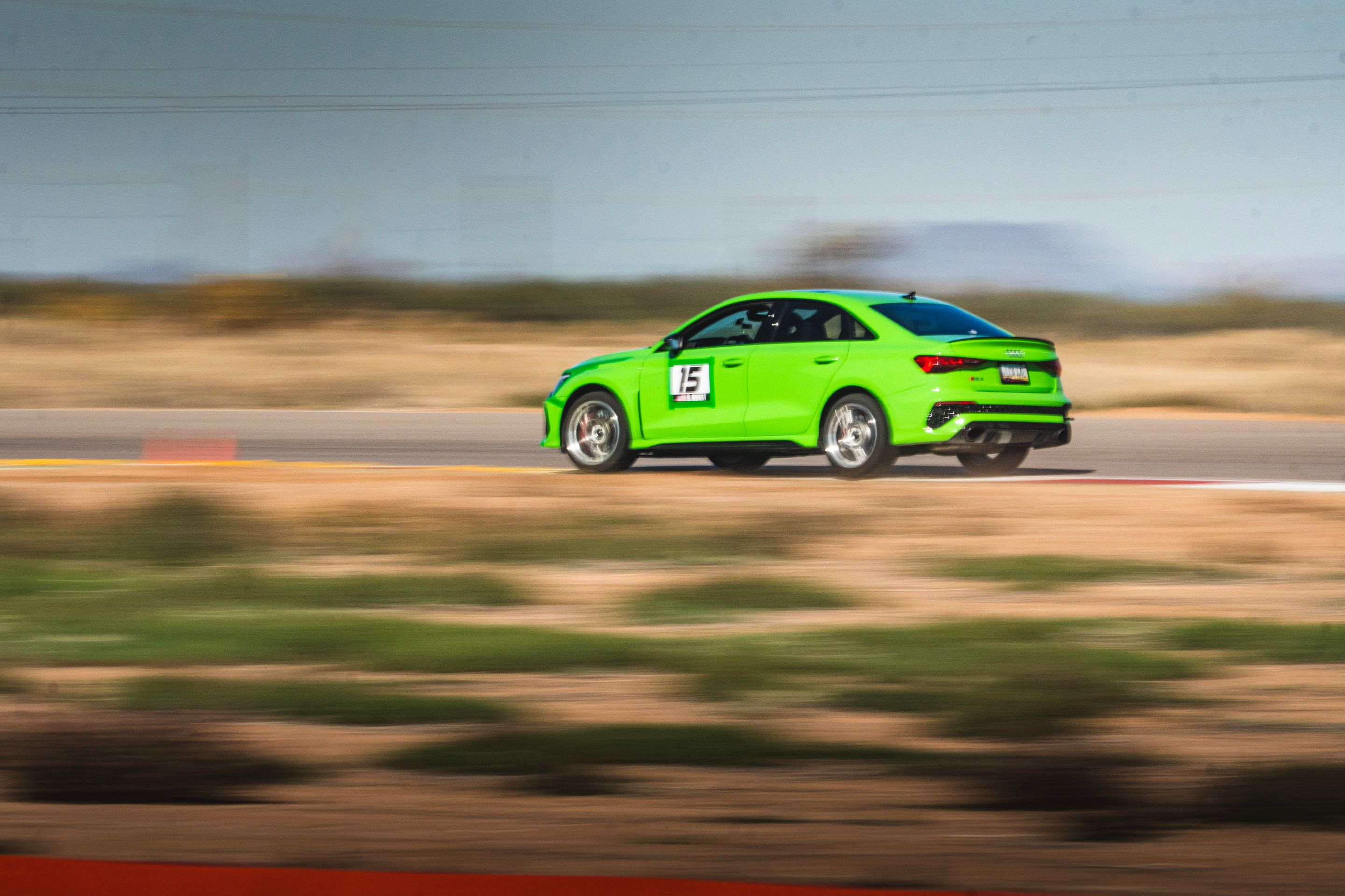 Green Audi 8Y RS 3 with 18" VS-5RS Apex wheels in Brushed Clear