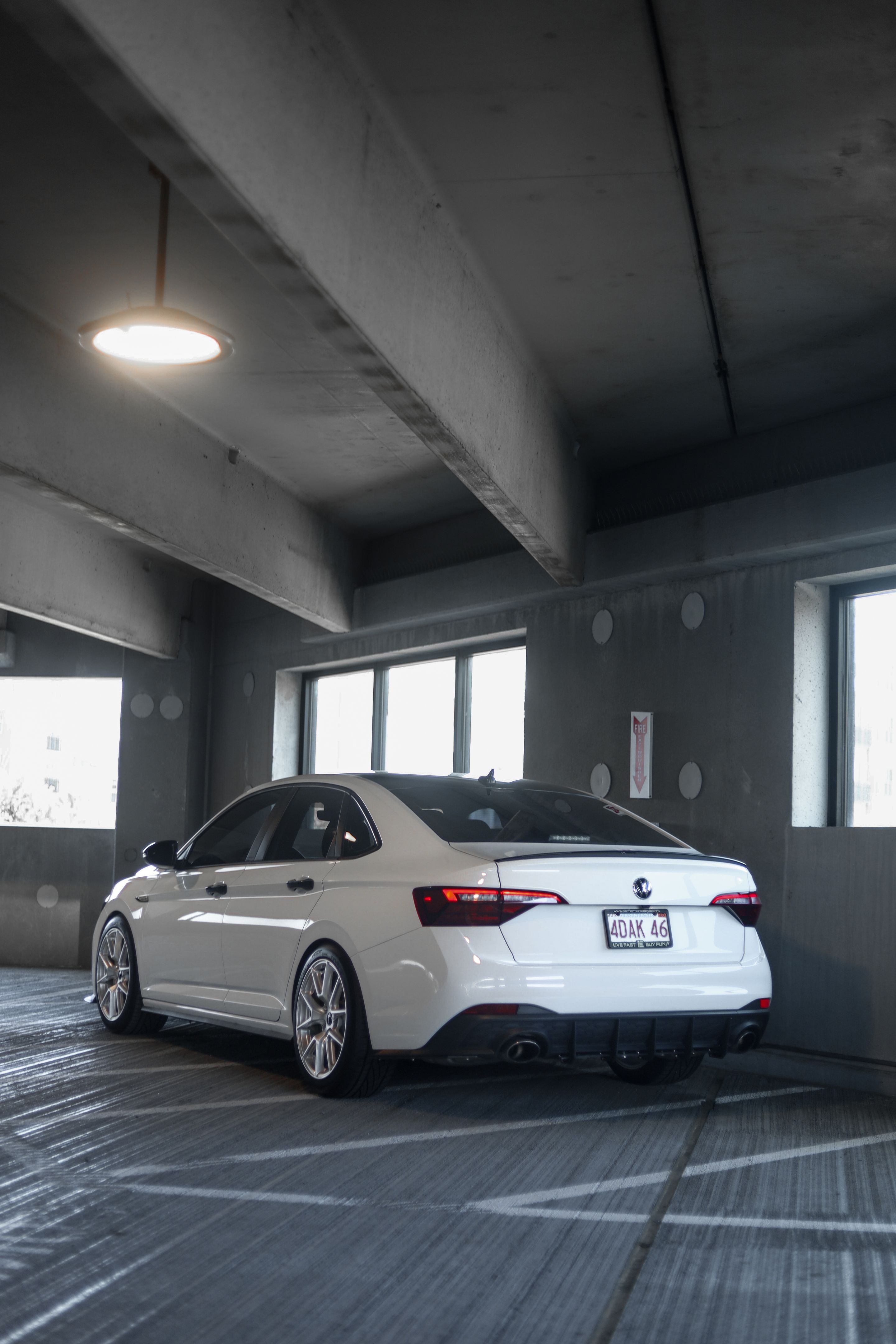 White VW MK7 GLI with 18" VS-5 Apex wheels in Race Silver